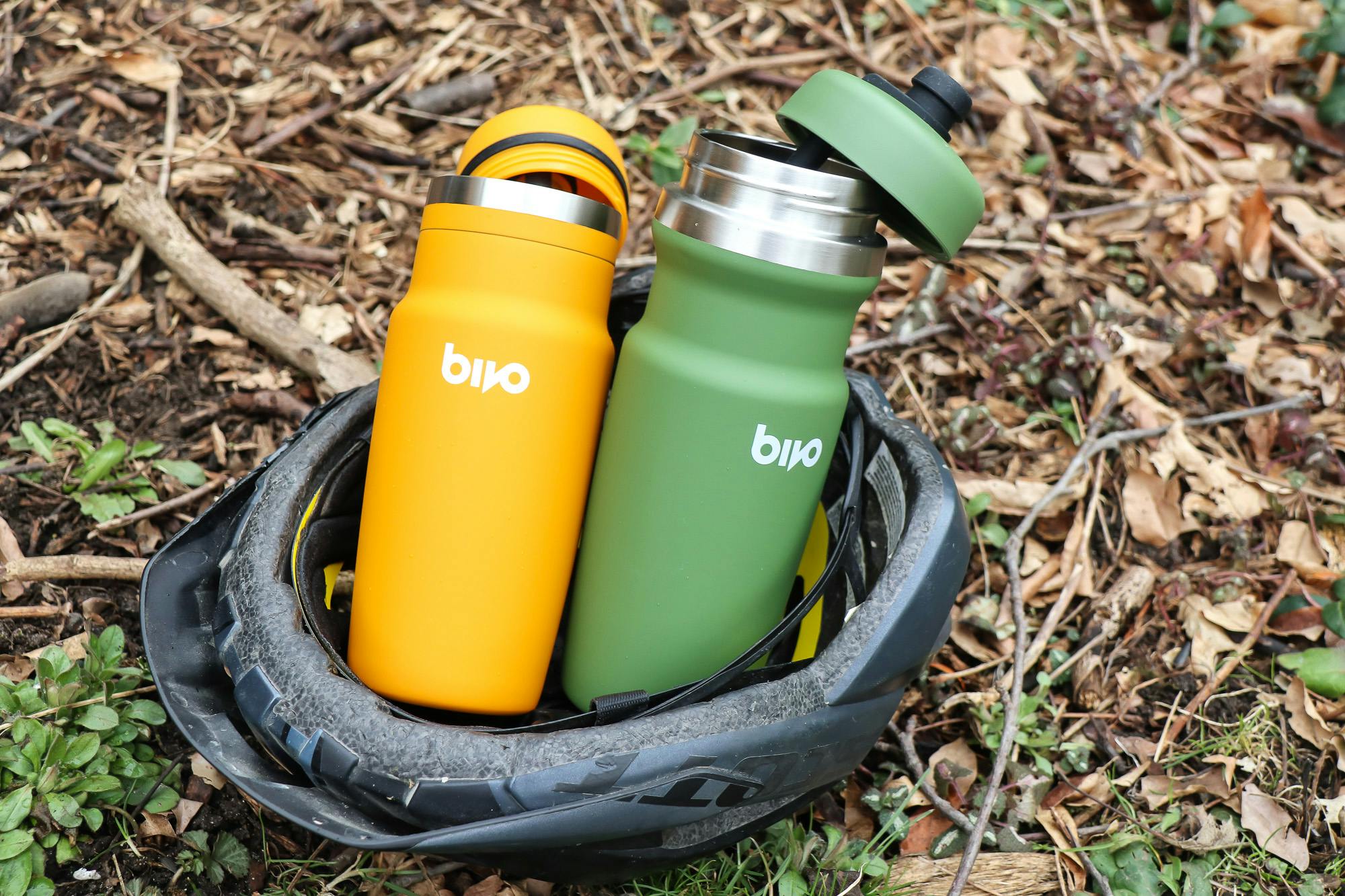 Two Bivo bottles in a helmet.