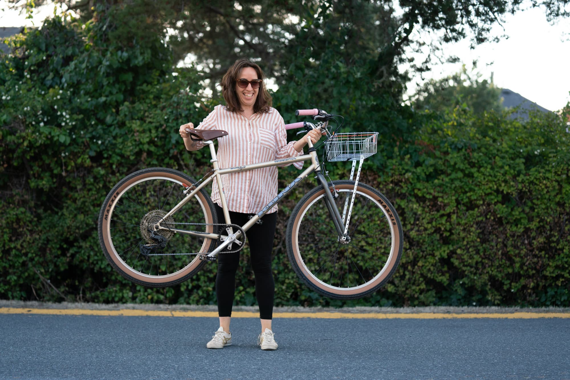 Brigitte holds up her birthday bike.