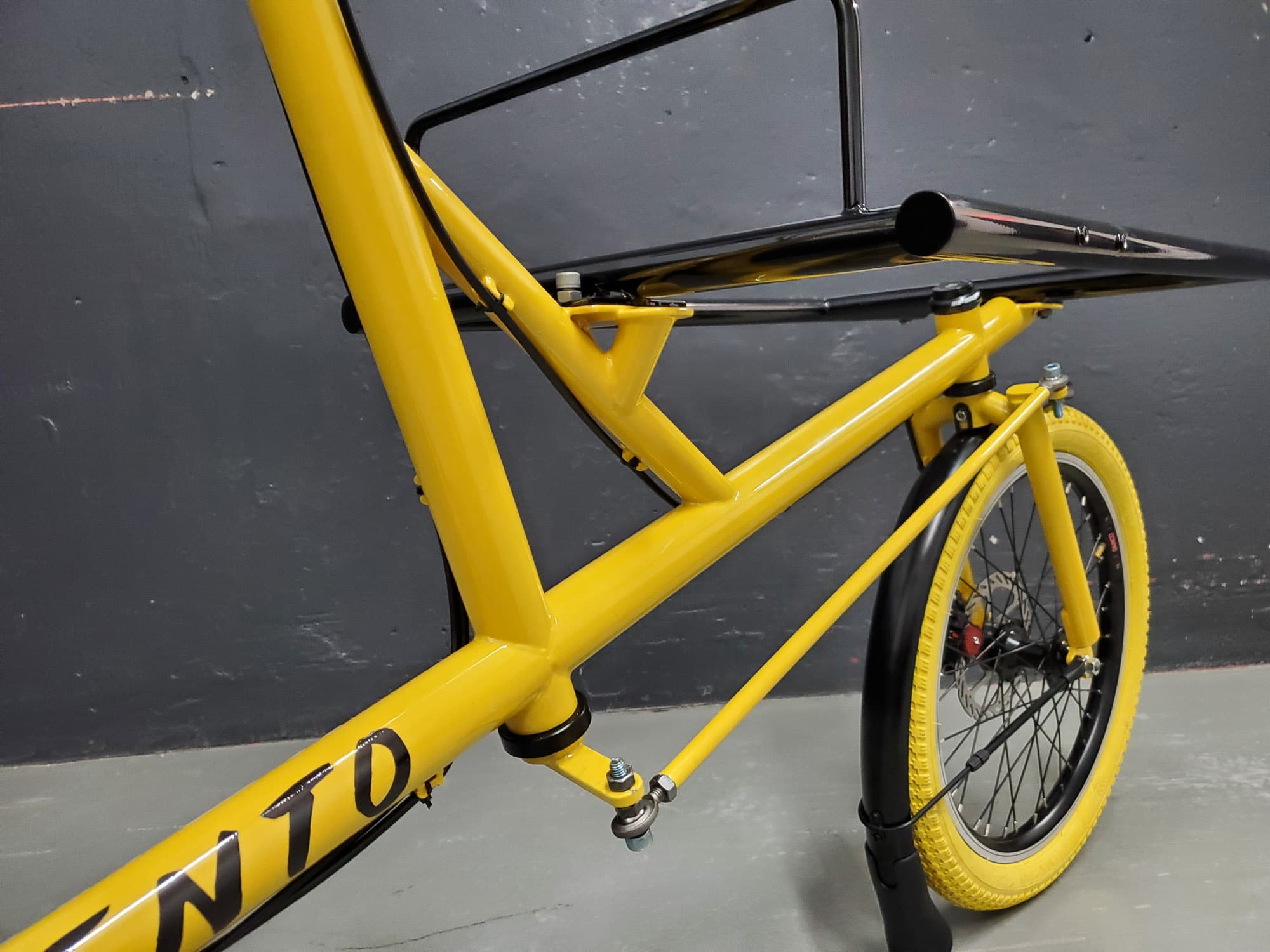 A closeup of the steering extender bar.