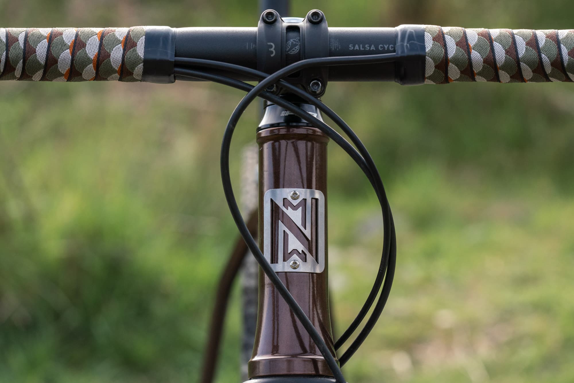 The Neuhaus Metalworks head badge.
