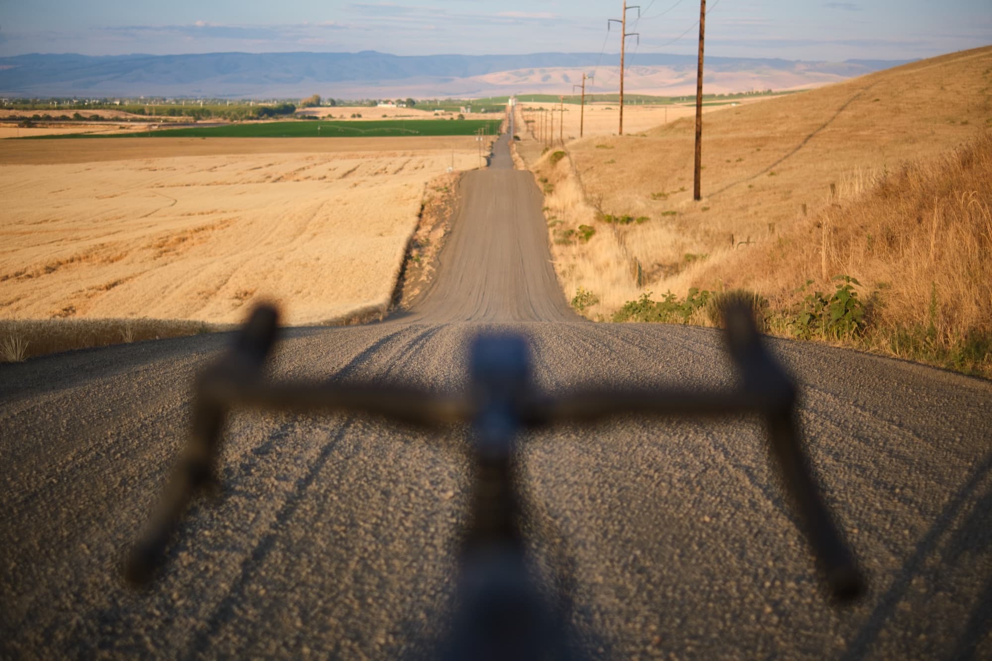 Hands off, eyes down a long gravel straightaway