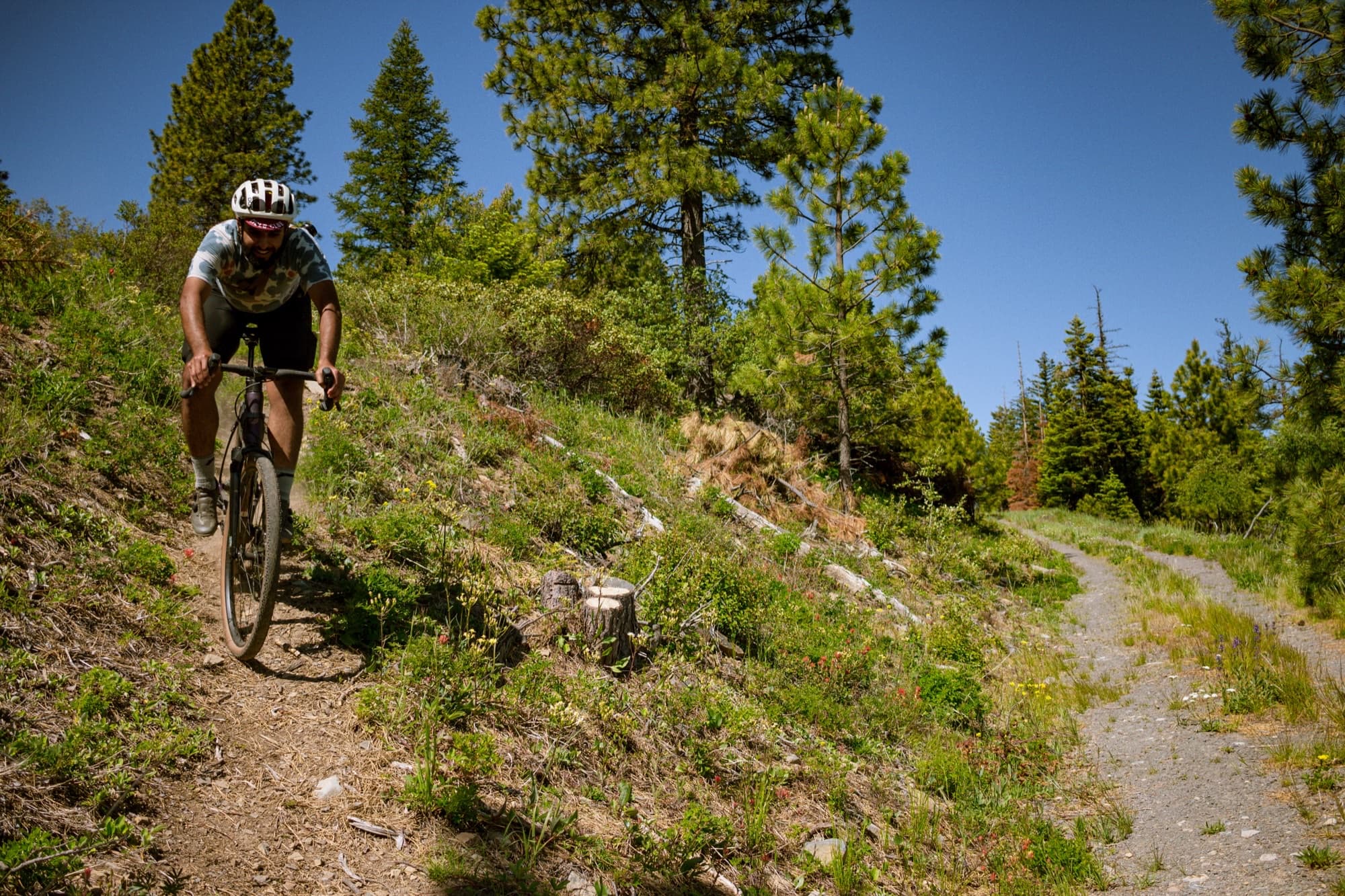 Sidehilling a loose, sunbaked singletrack cut