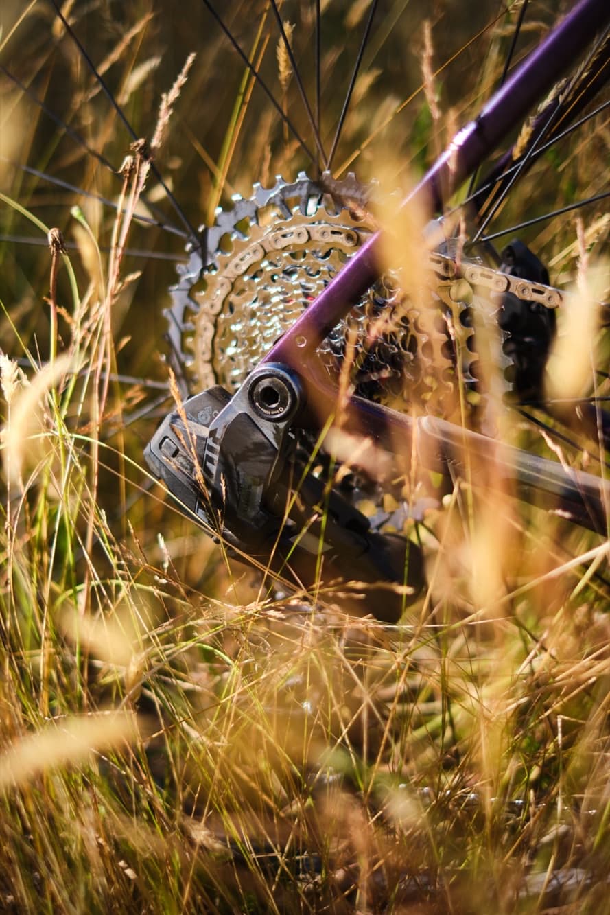 SRAM Rival XPLR's 10-46t cassette up close in the grass
