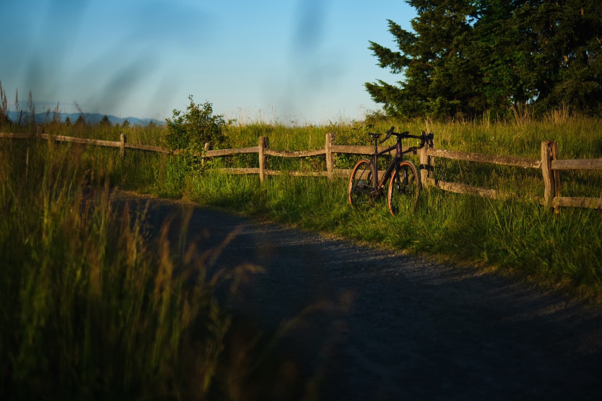 The Flyway parked at a fence line as the sun drops