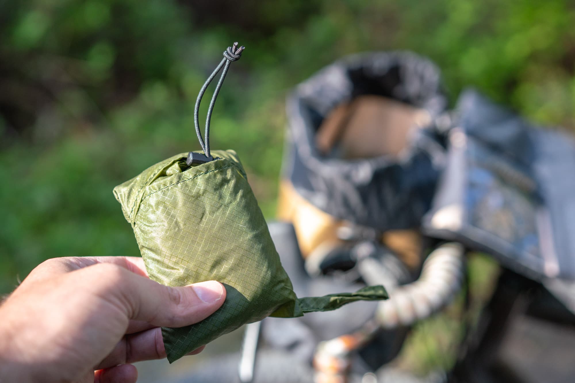 The raincover pouch.