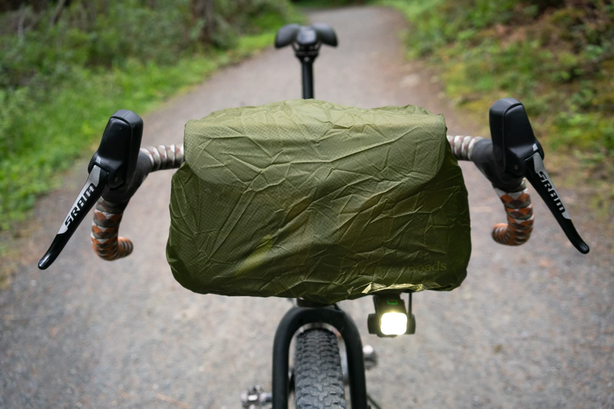 The OCT Bag raincover and lightmount.