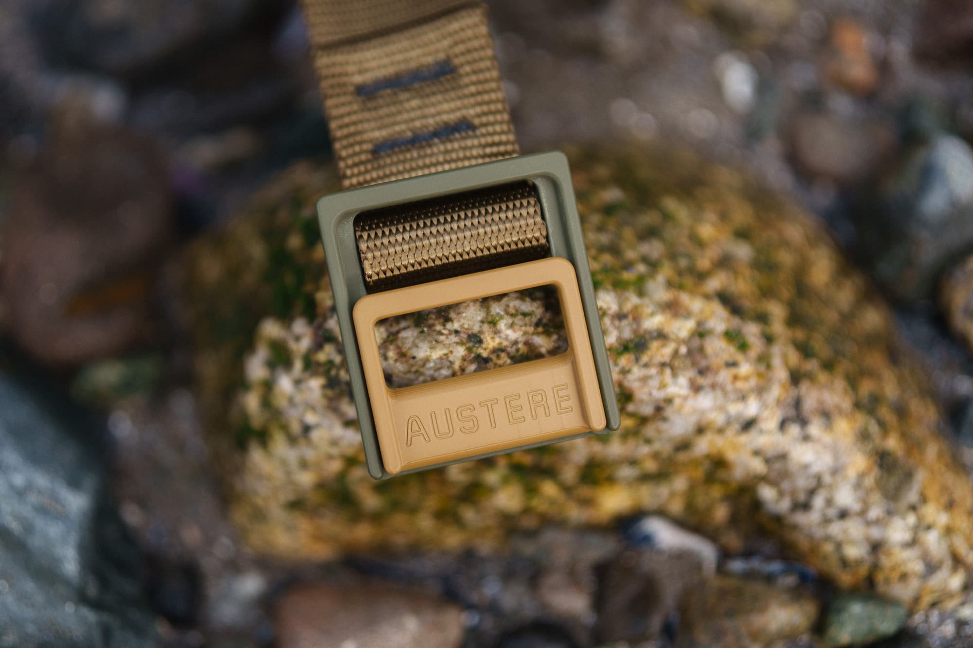 An Austere lock belt on a rock.
