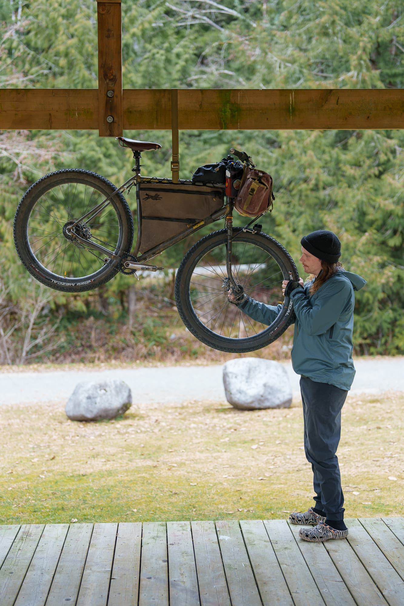 Tom works on his bike.
