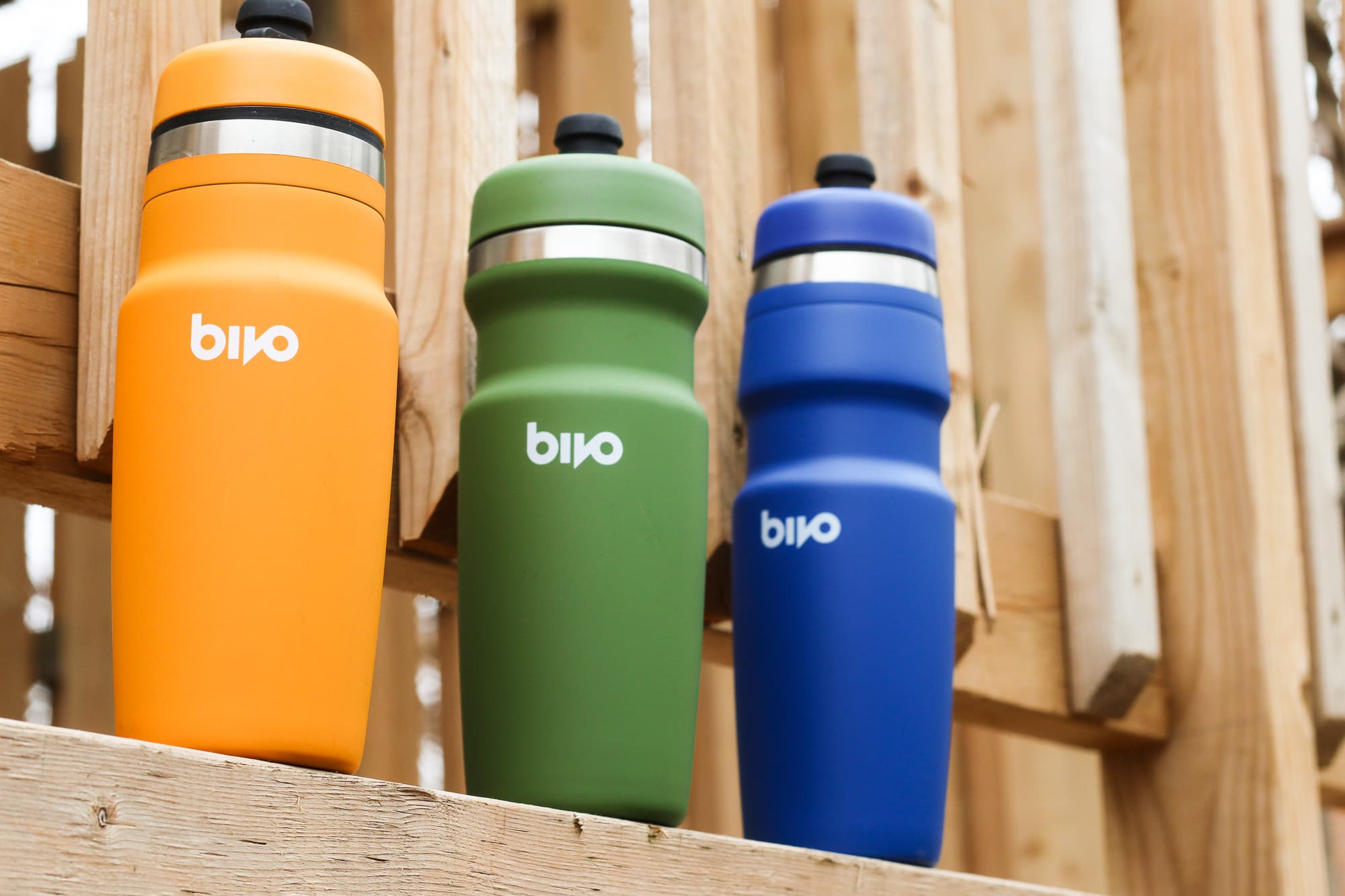 Three water bottles lined up.