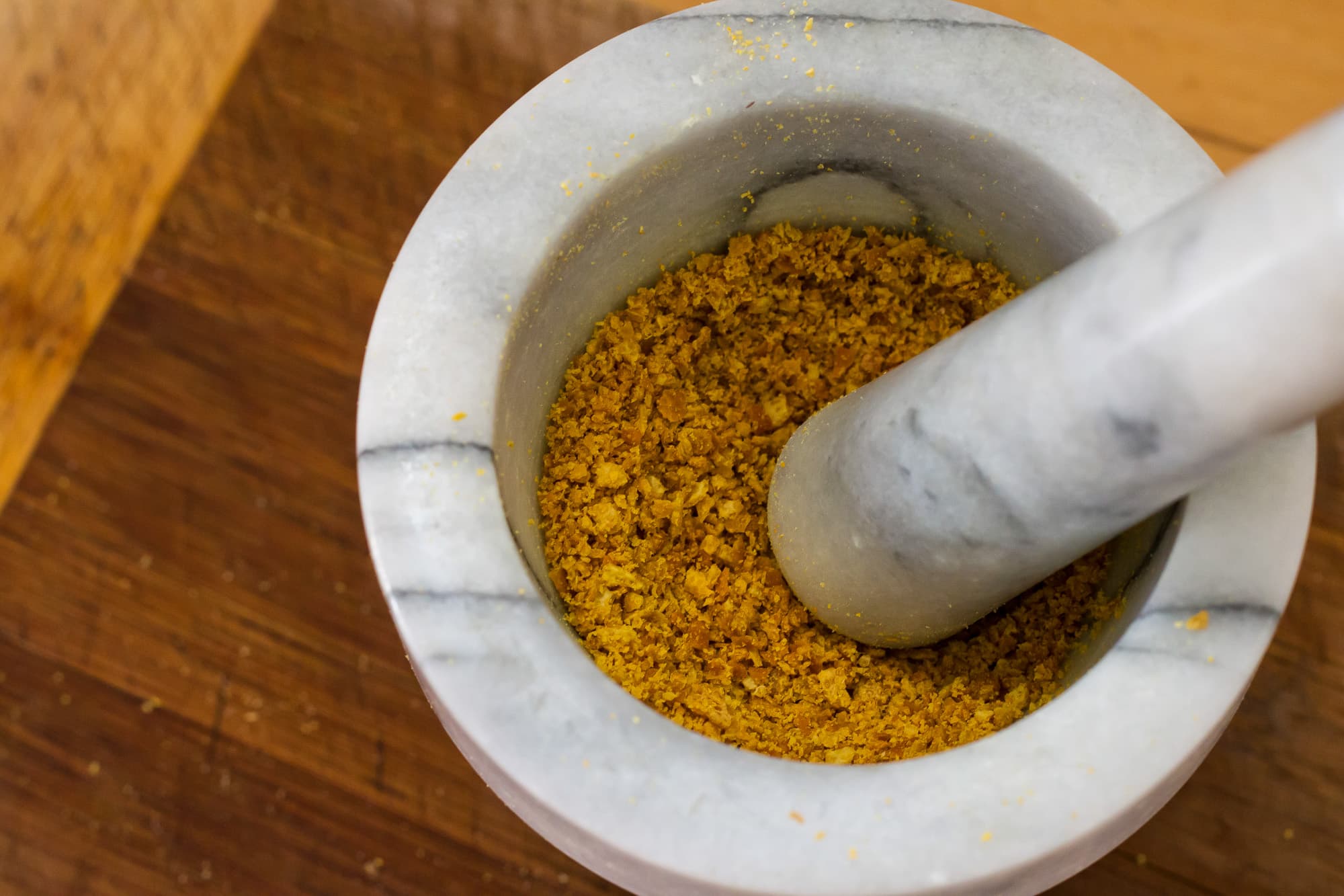 Citrus powder being ground up.