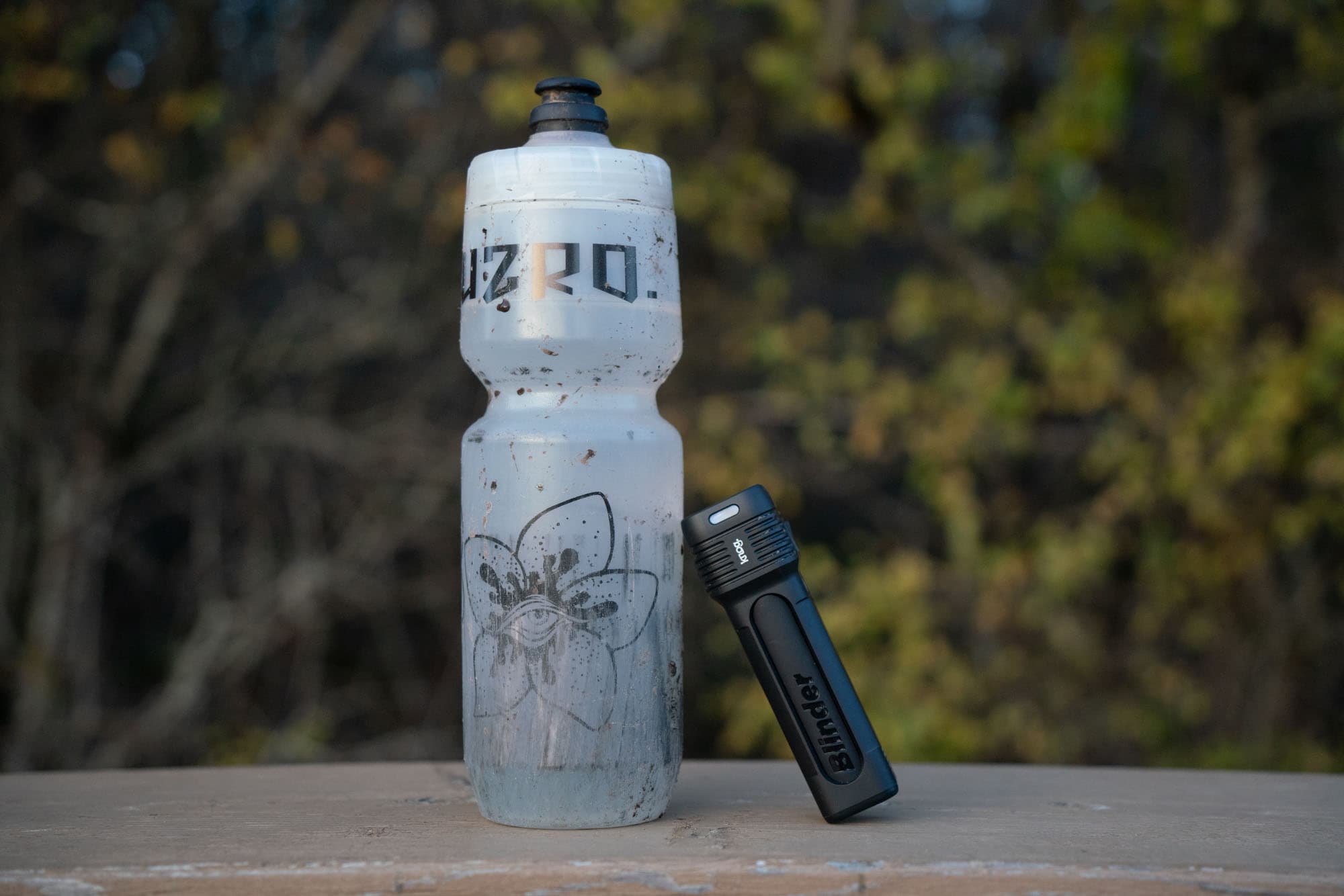 Knog Blinder 1300 compared to a water bottle.