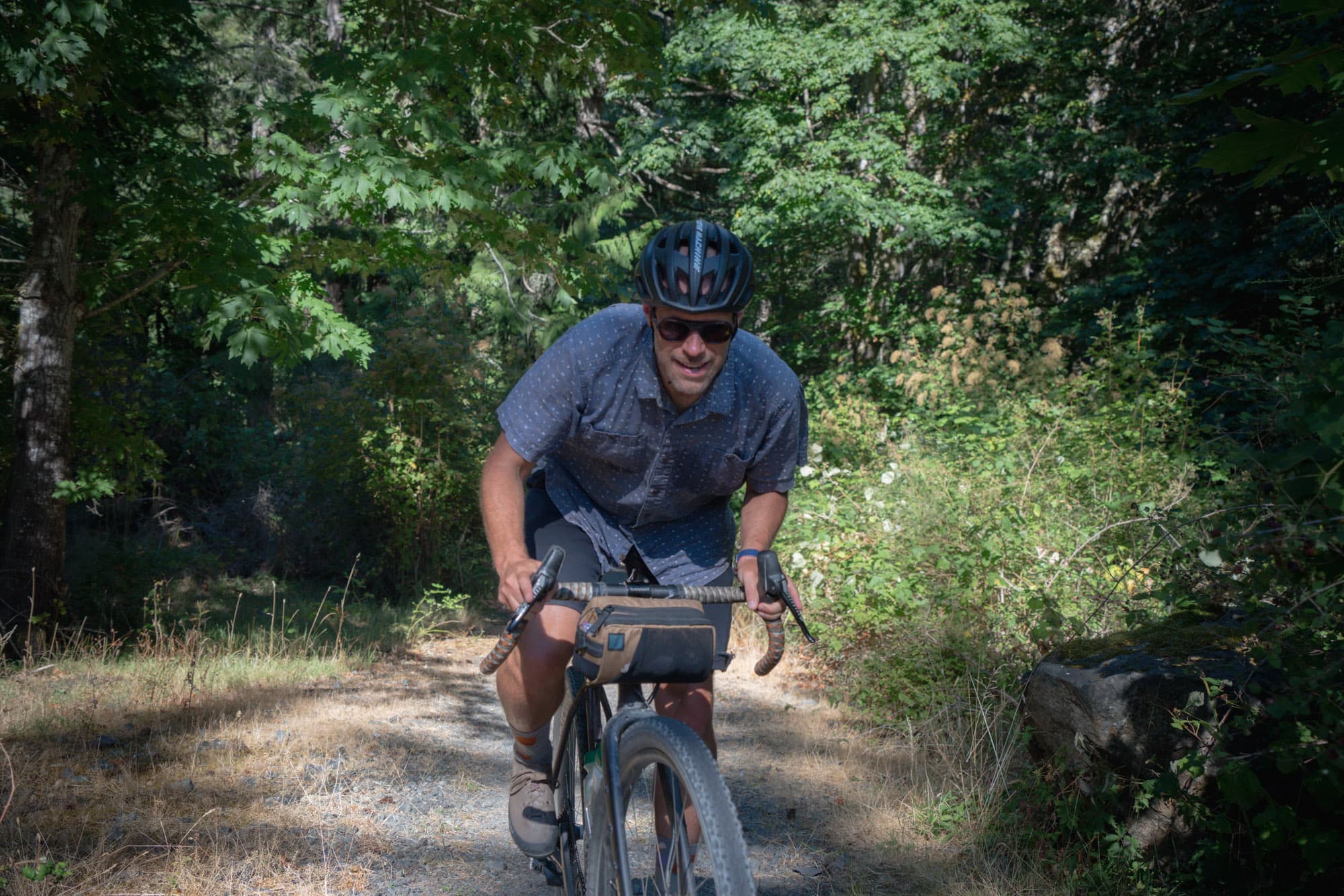 Biking towards the camera with Ombraz Cammina.