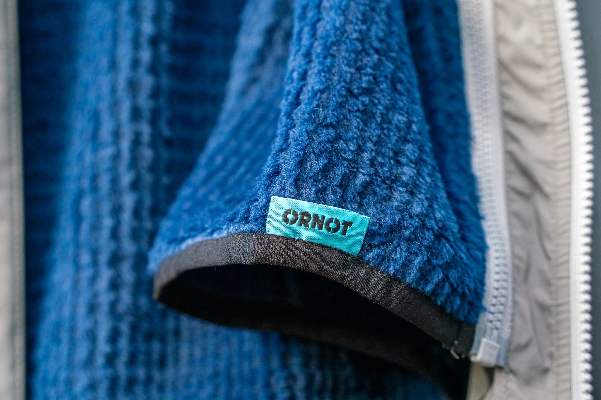 vest logo closeup