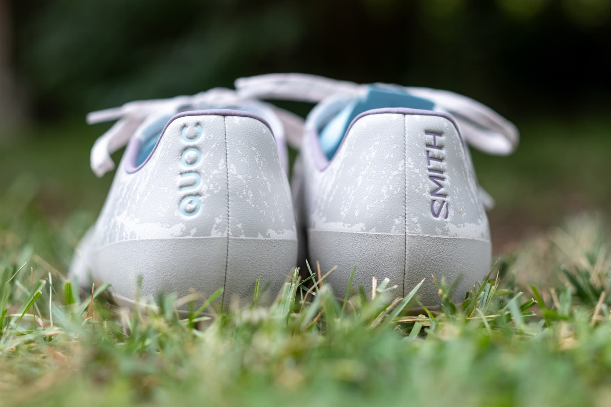 Heel view of the Smith x Quoc Gran Tourer XC Lace, with QUOC and SMITH printed on the heel counters.