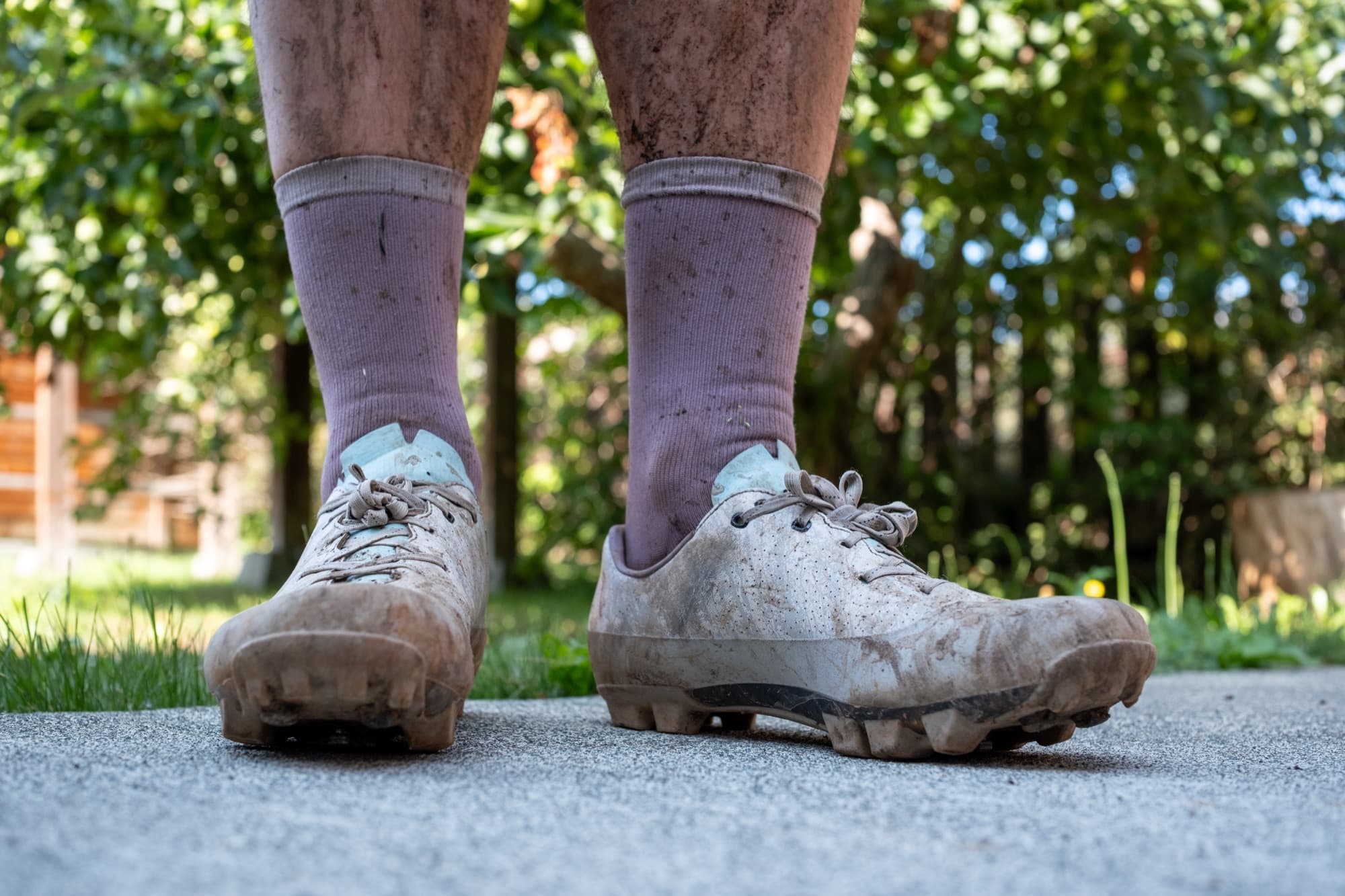 Jeff standing in his muddy Gran Tourer XC Lace shoes after a gravel ride.