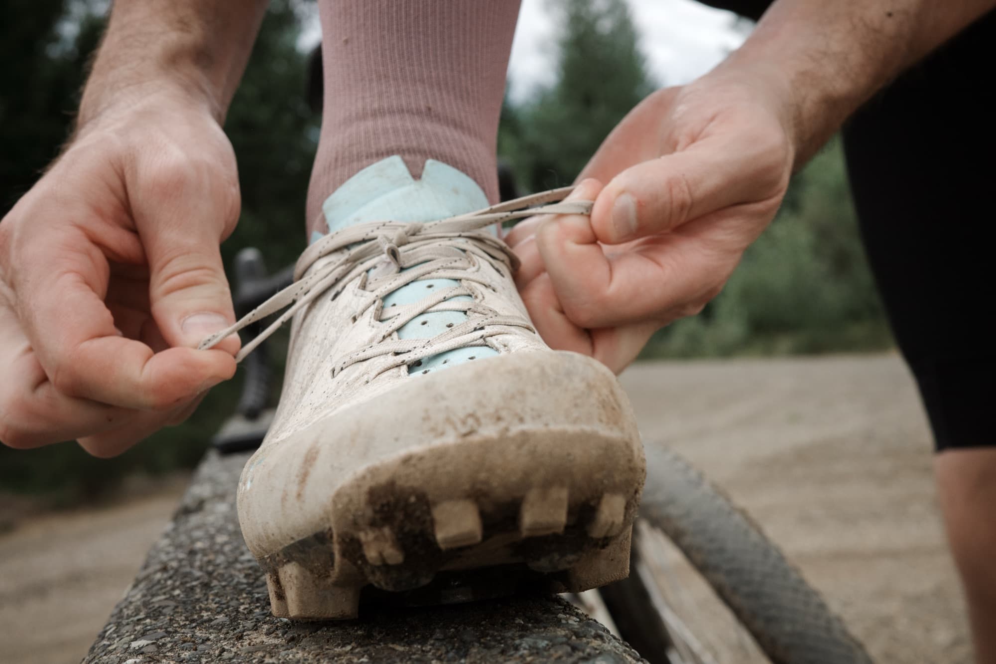 Snugging the laces across the forefoot of the Gran Tourer XC Lace.