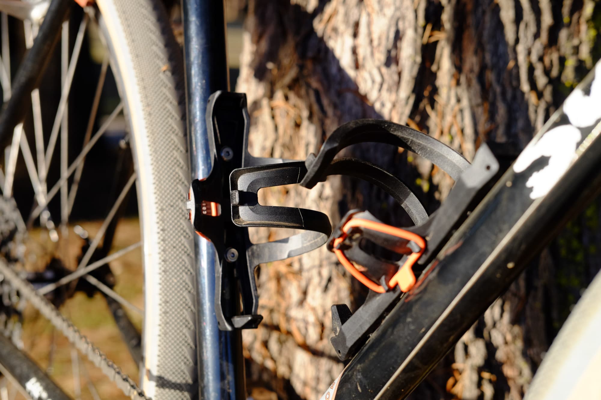 Two cages without bottles.