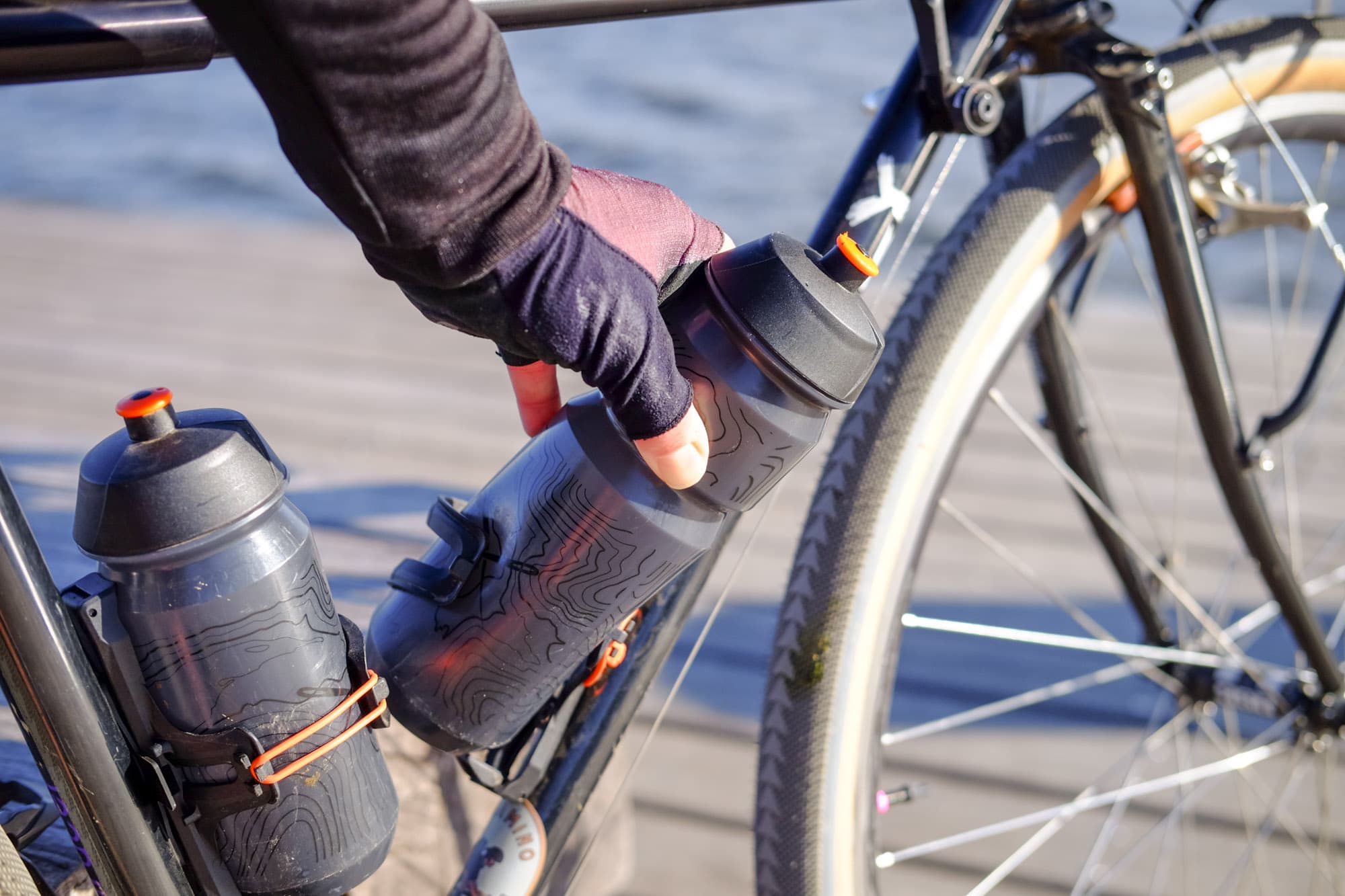 Stu grabs his bottle.