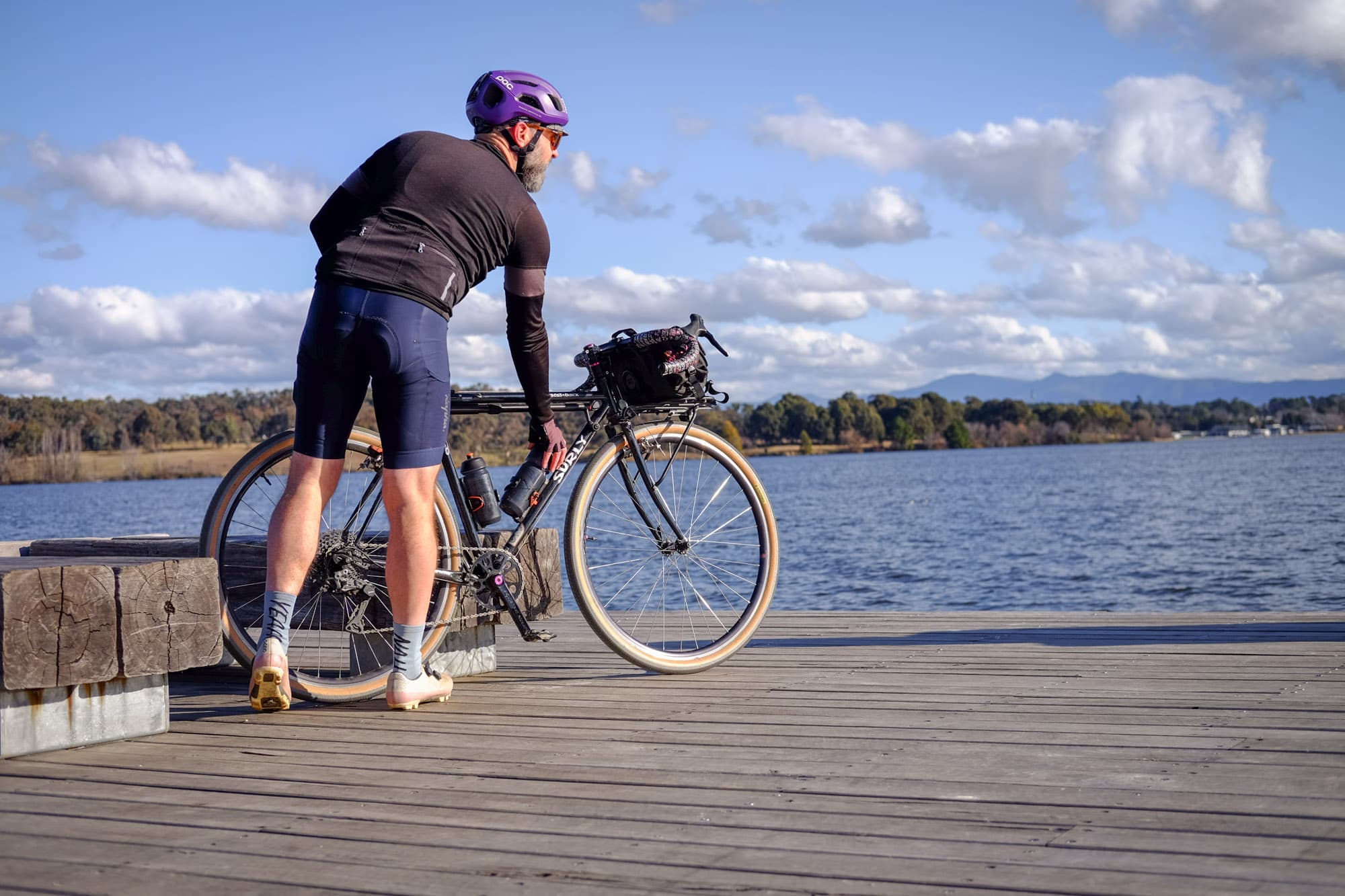 Stu easily puts his bottle back.