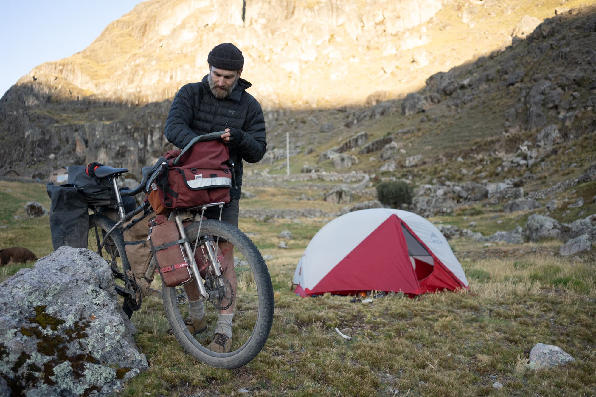 Tom packs his Road Runner Bags and heads out of camp.