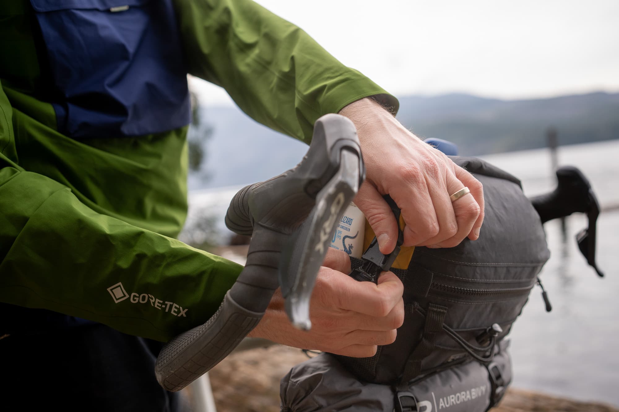 Doing up the side buckles.