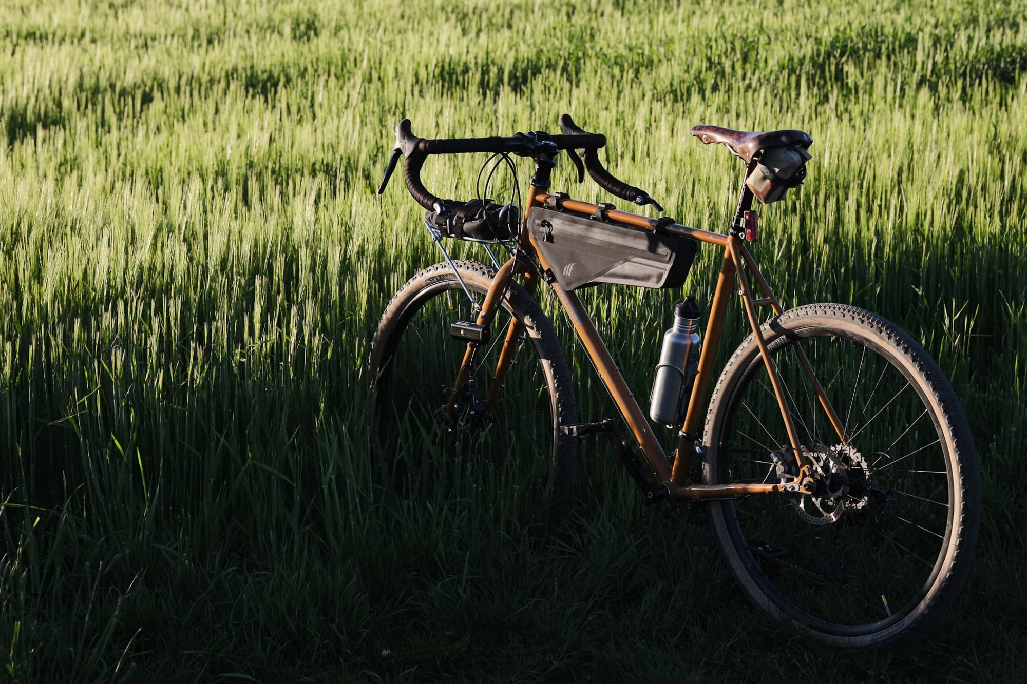 Geralds bike in a field.