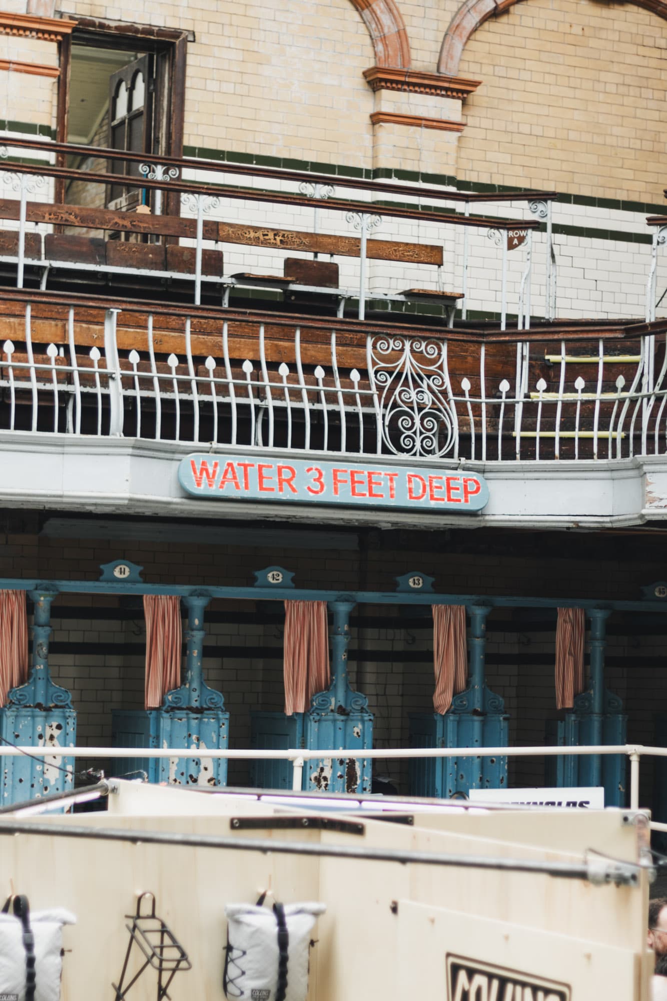 An old sign in the city baths.