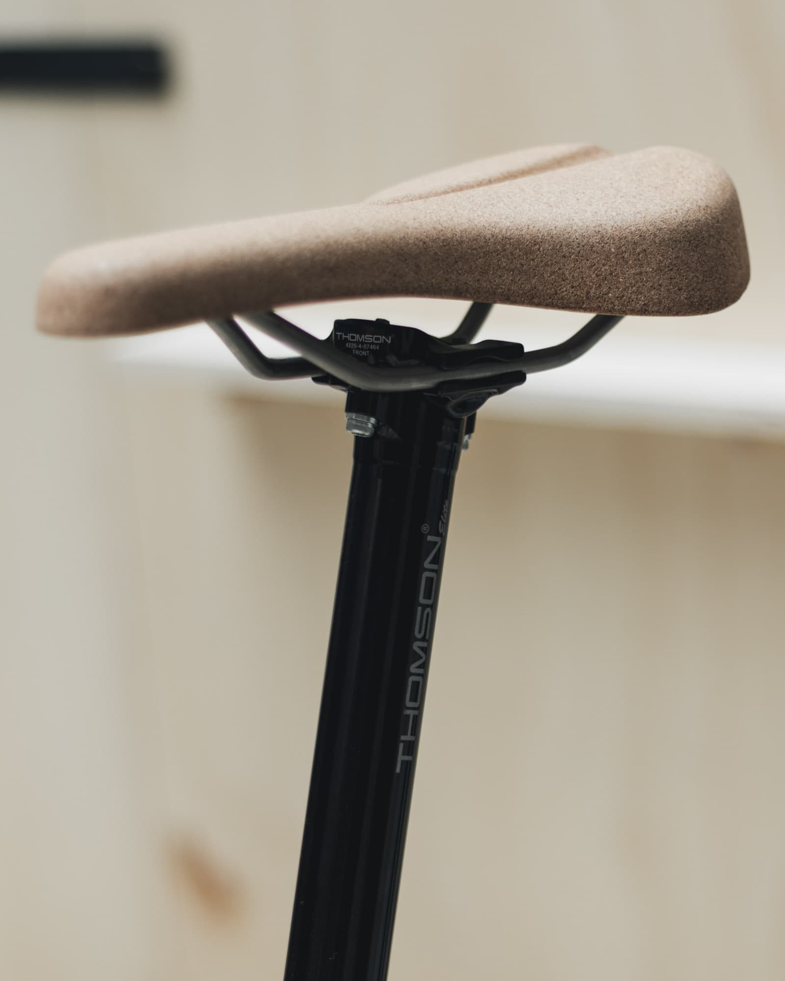 A close up of the Frame Cycles cork saddle.