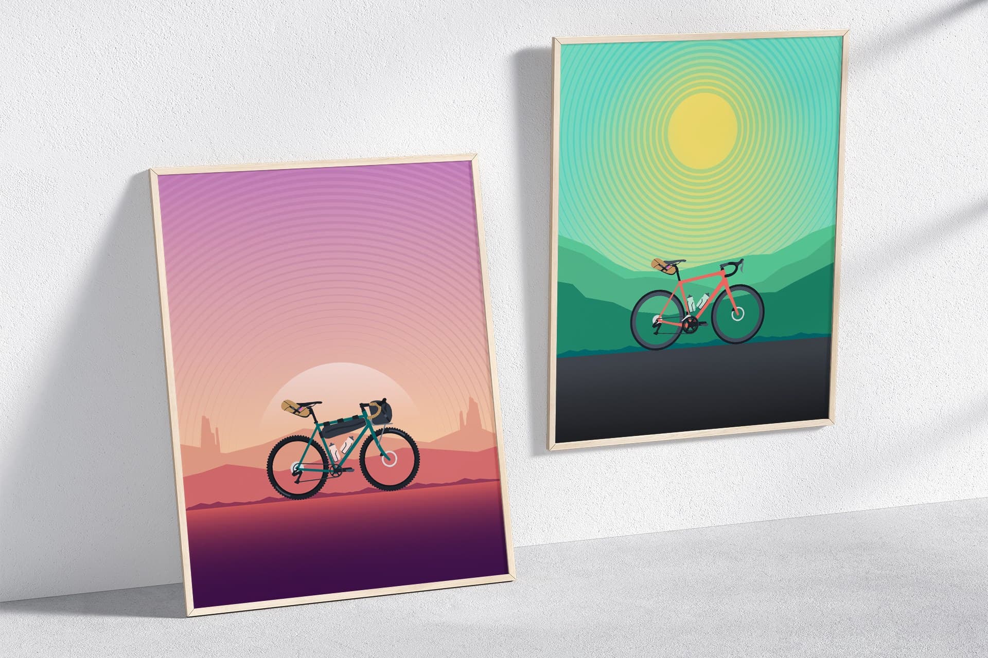 Two Bike Anywhere posters printed and framed, leaning against a wall