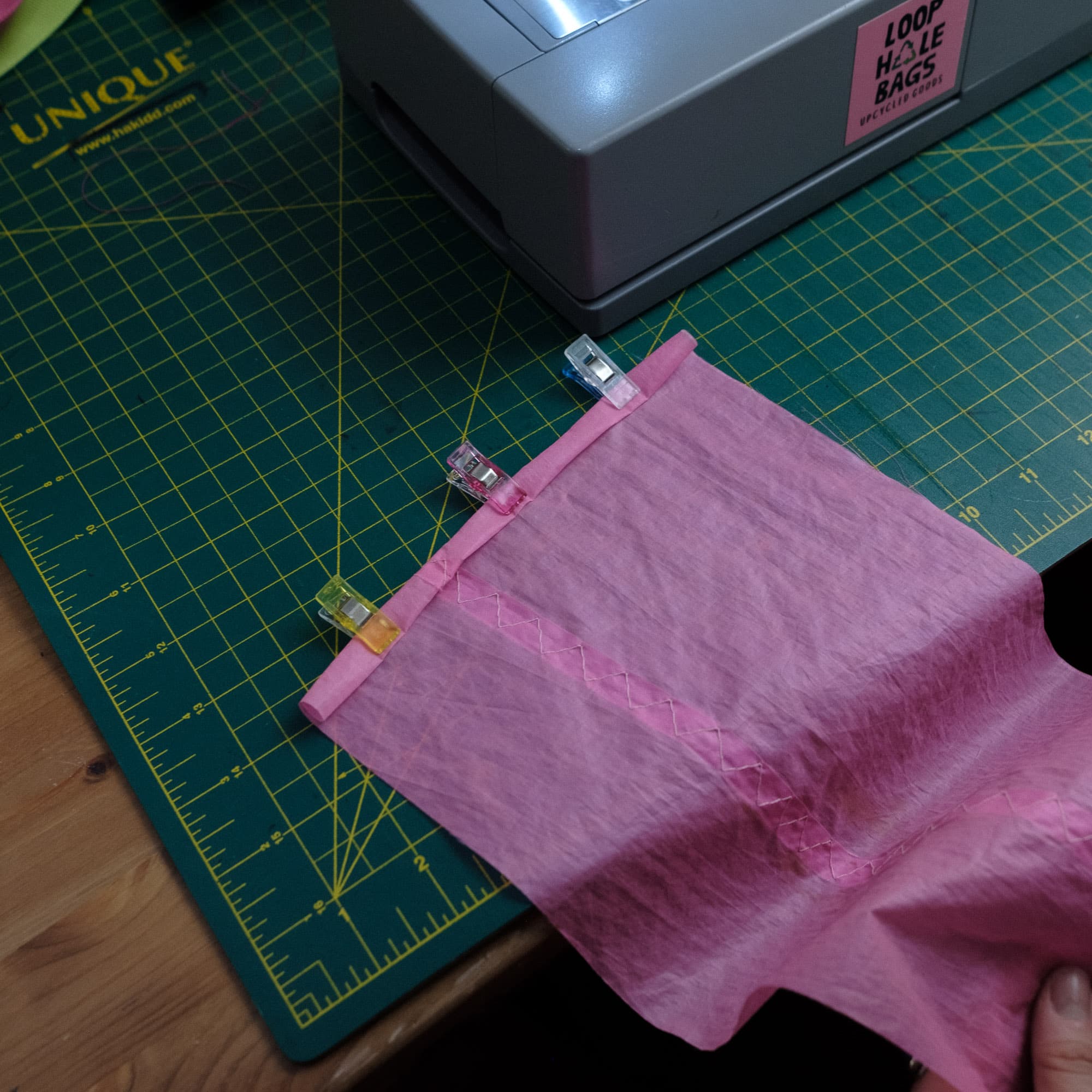 Fold over the edges of the pocket.