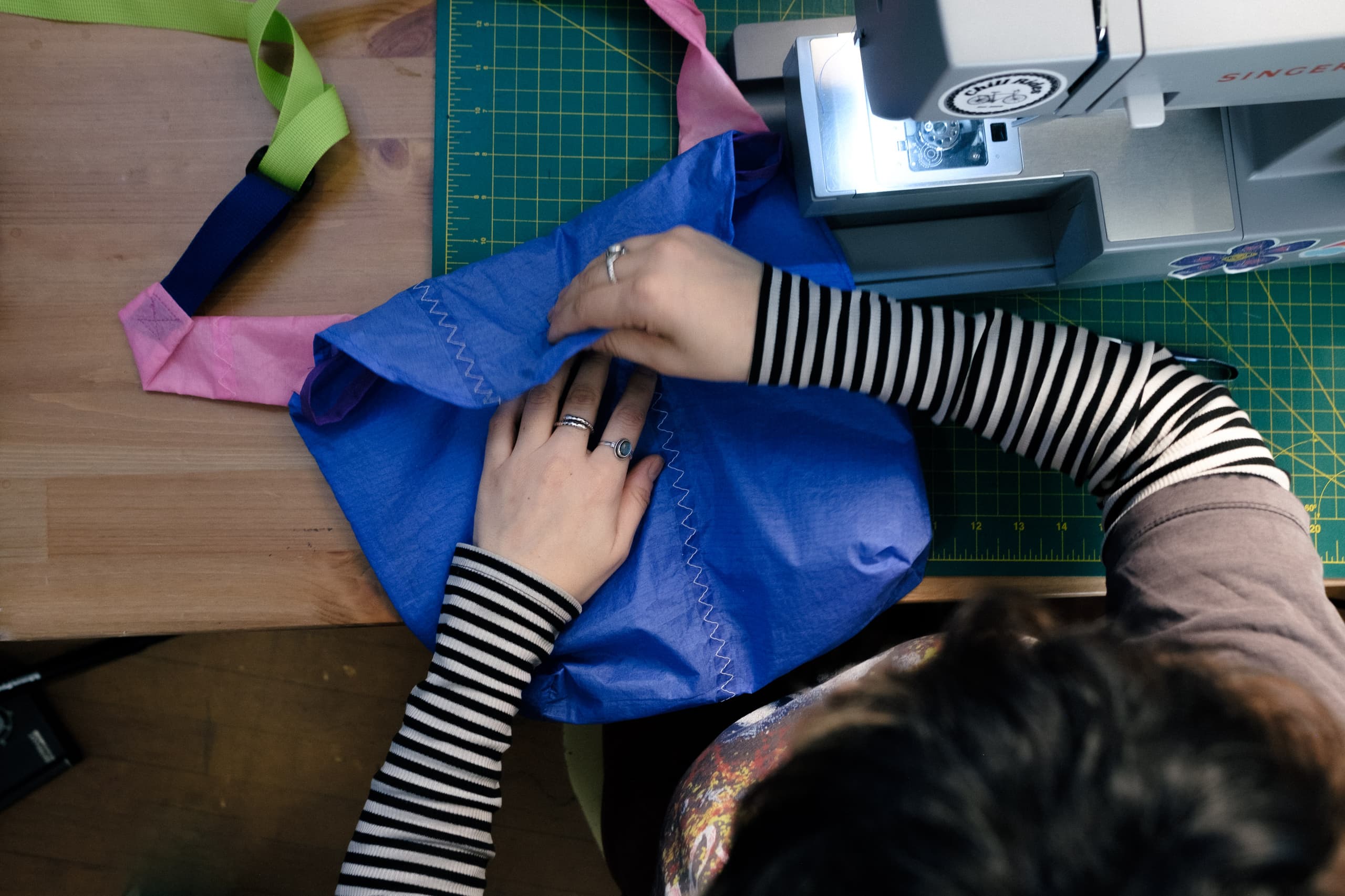 Cass makes the final folds.