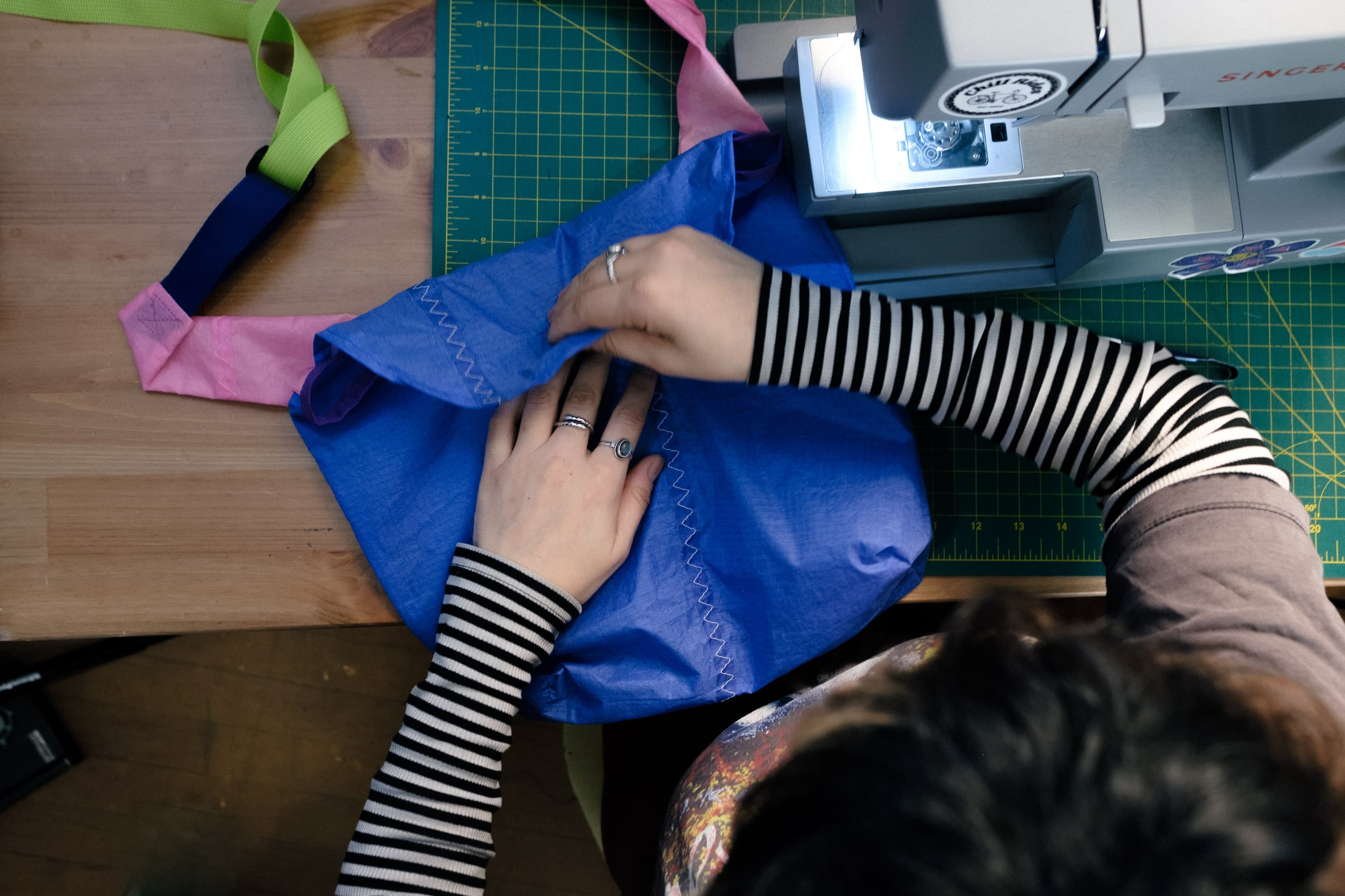 Cass makes the final folds.