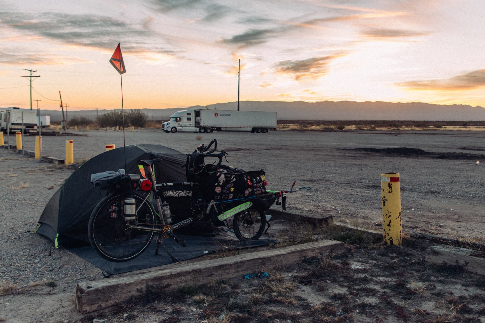 Erik camps in a truck stop.