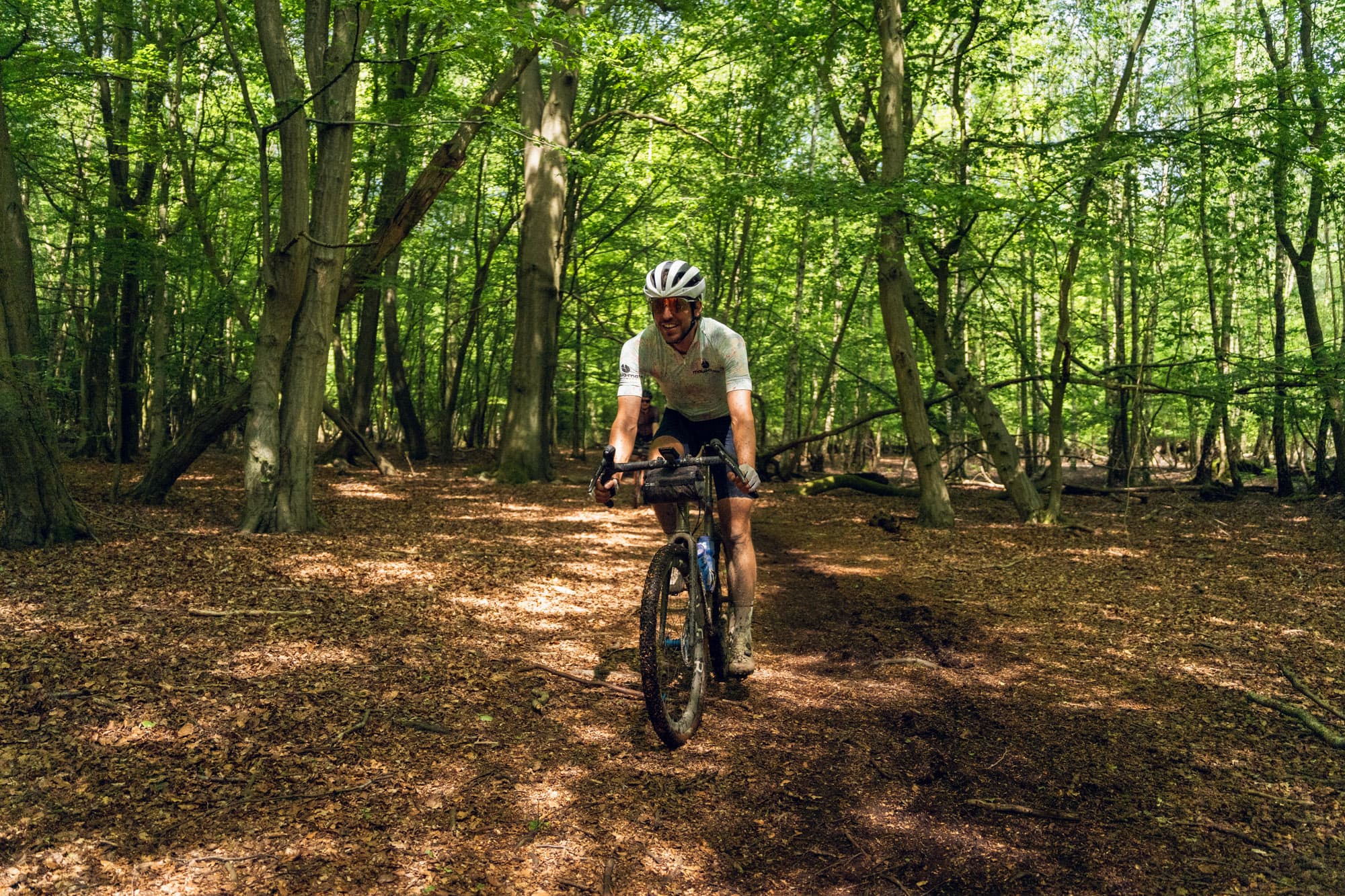 Riding bikes in the forest.