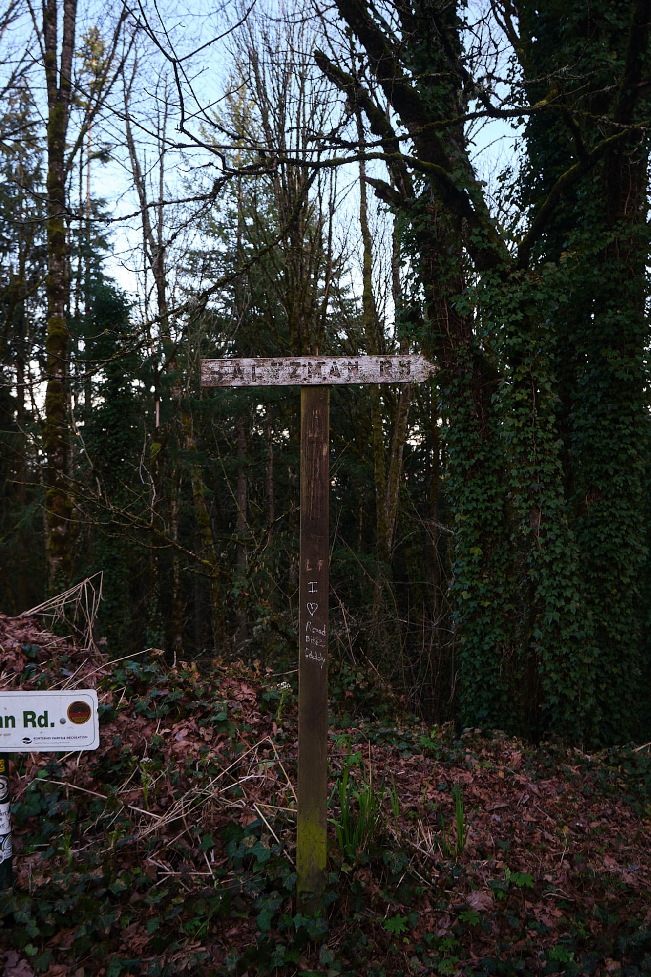 A trail sign in Portland gravel.