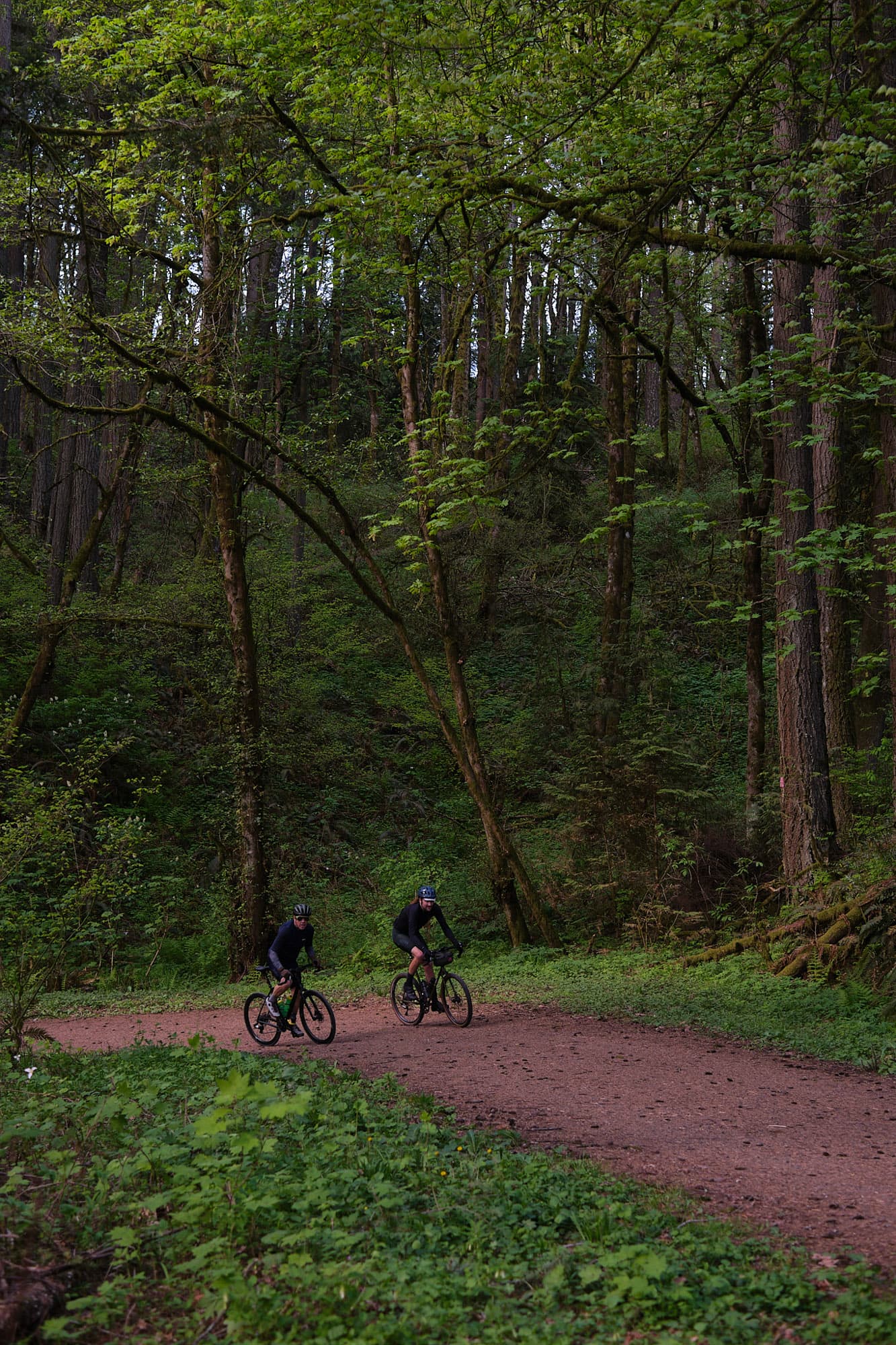 Two riders do the climb in Portland.
