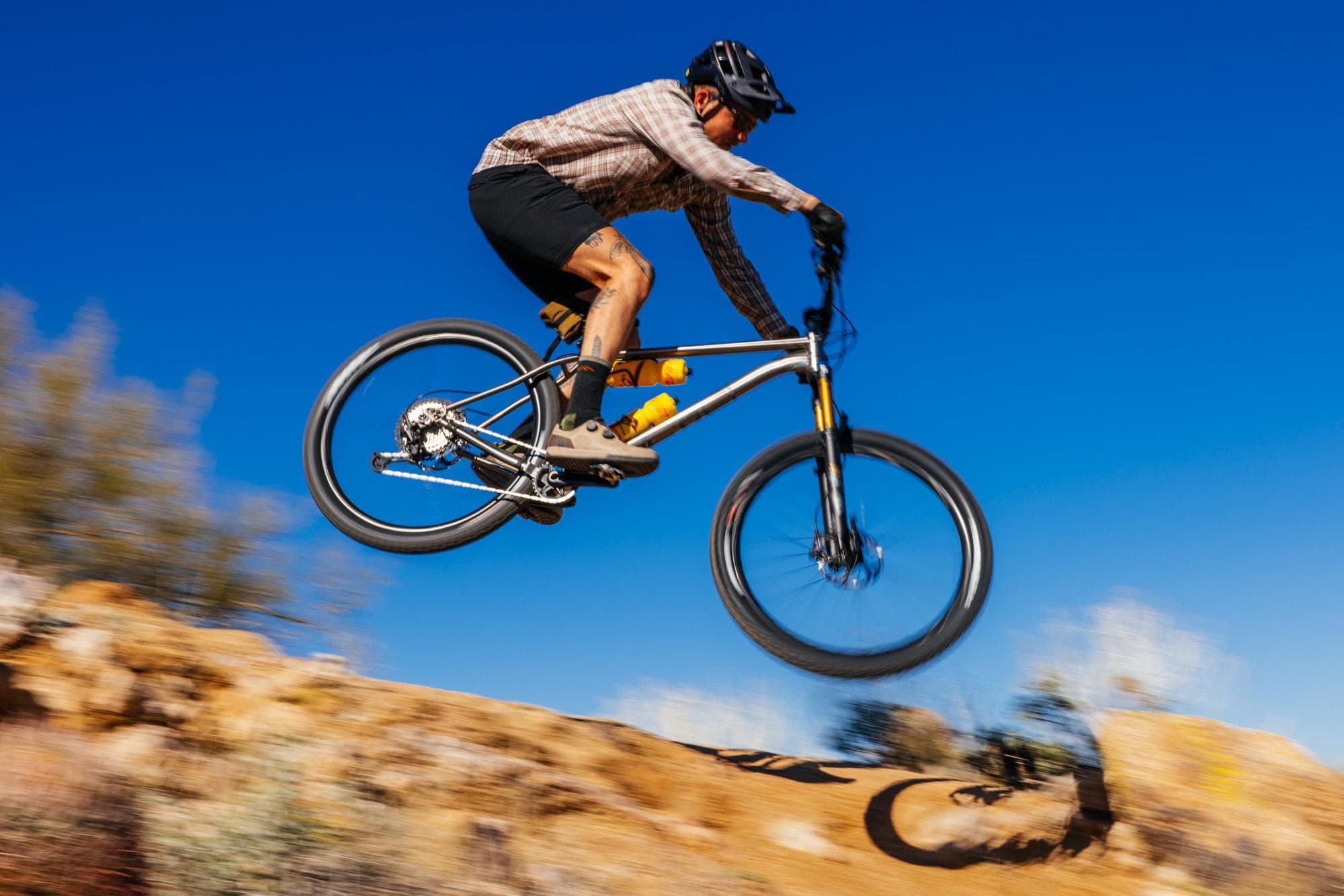 John Watson flies through the air.