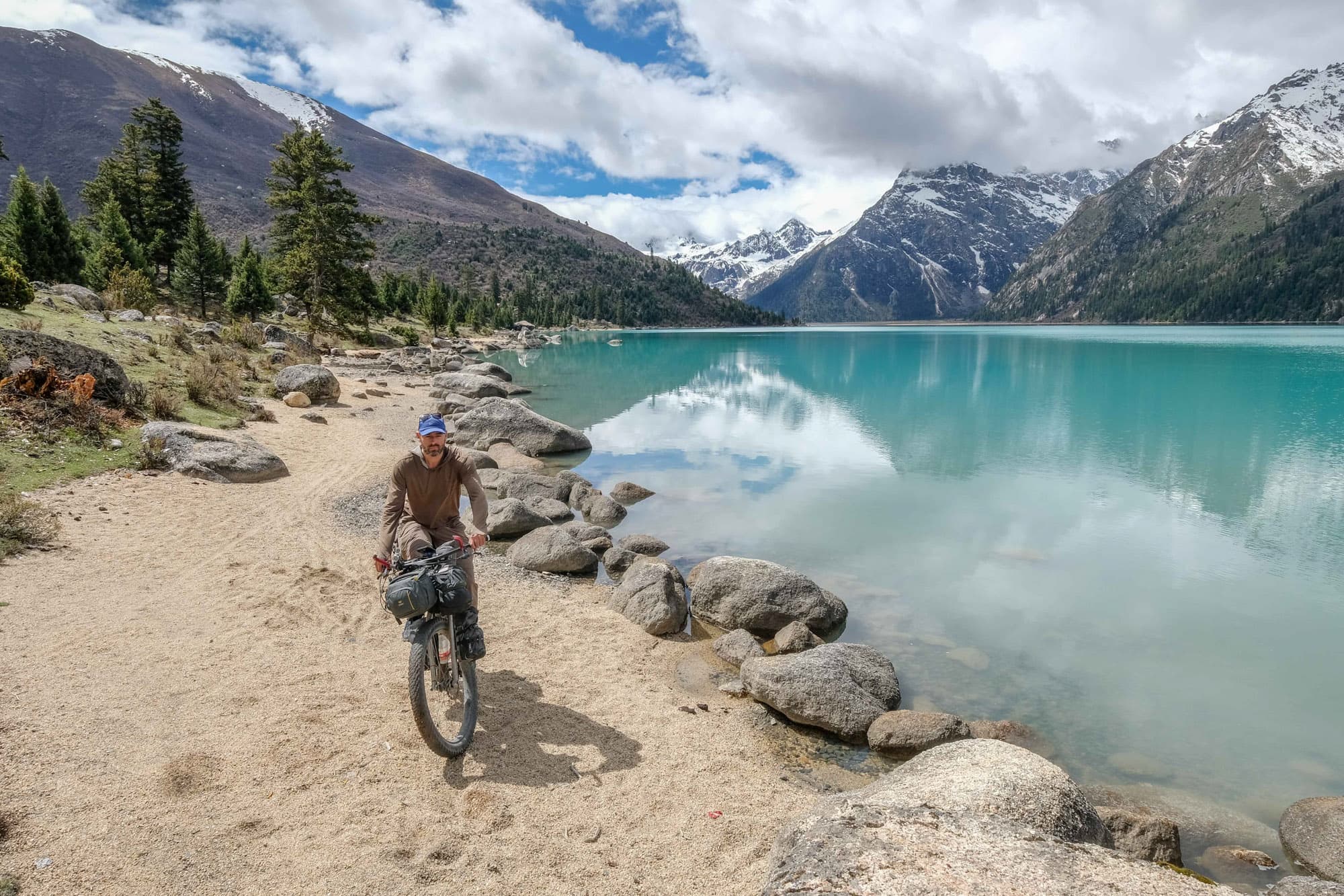 A beautiful highland lake and bikepacker.