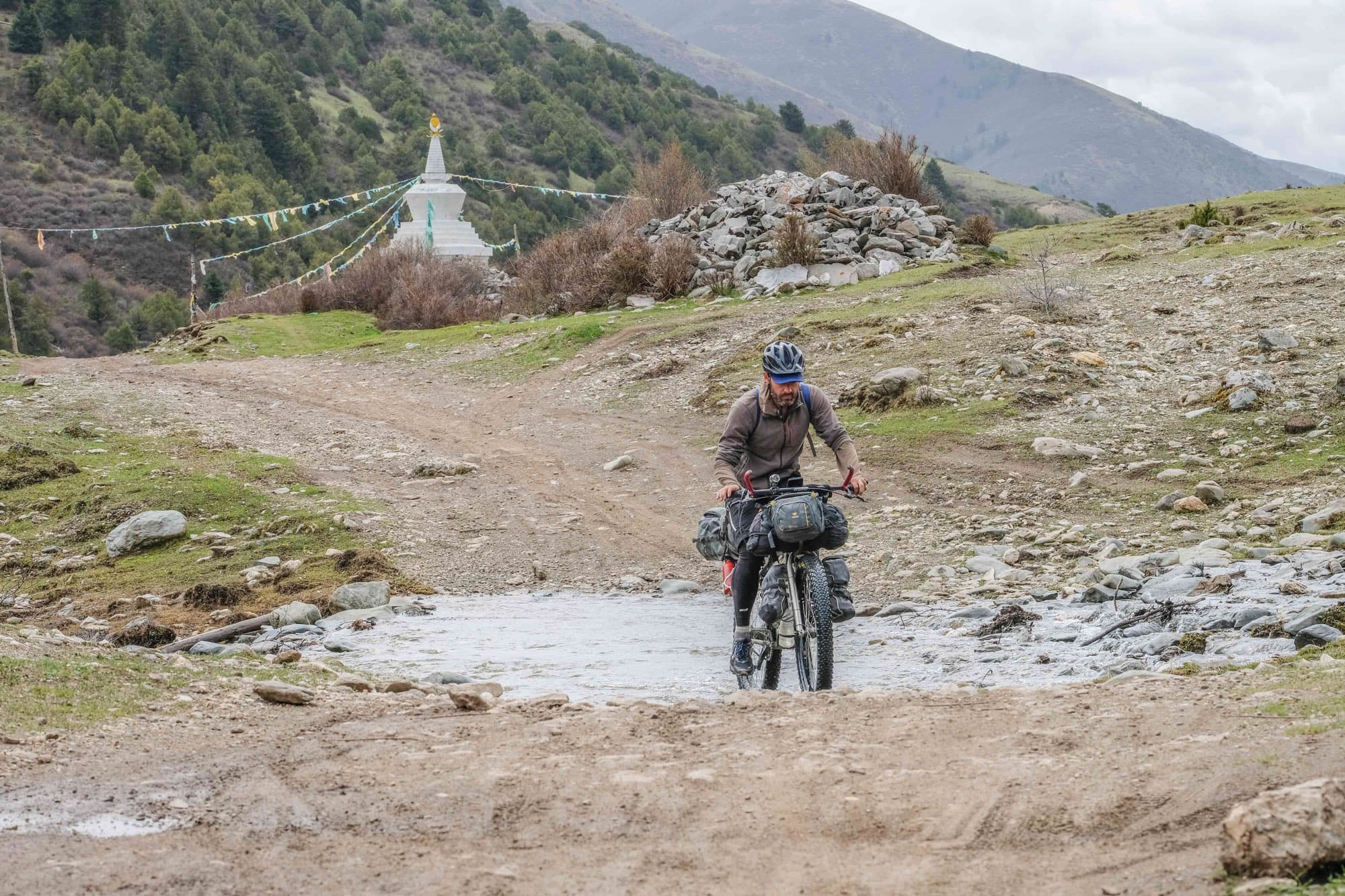 Matthew rides hard in Tibet.
