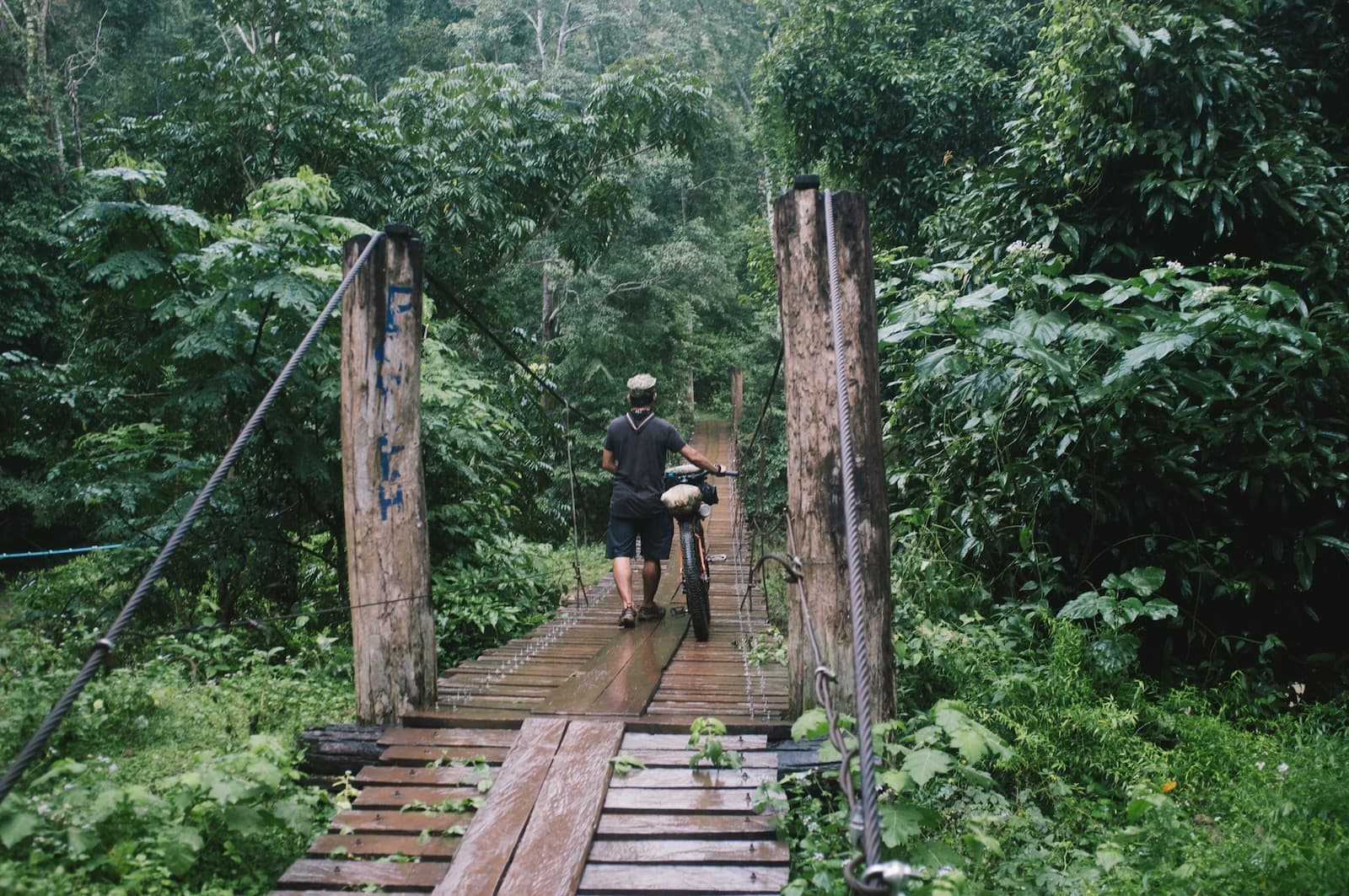 Man With Bike On Bridge