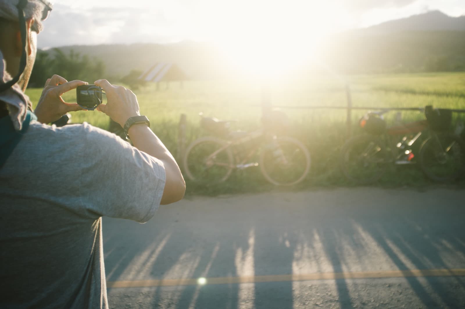 Woman Taking Photo of Bike