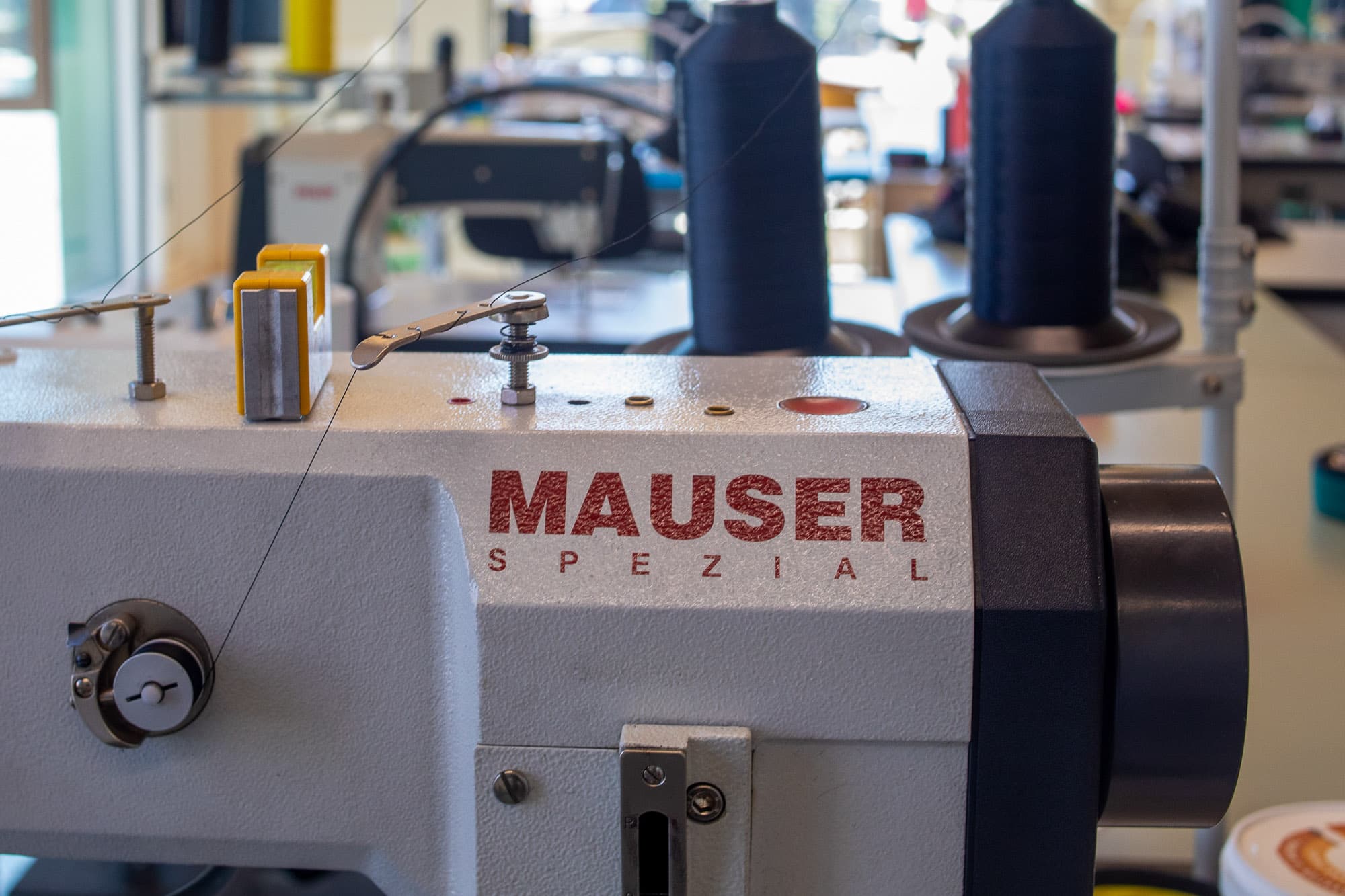 A sewing machine takes a break.