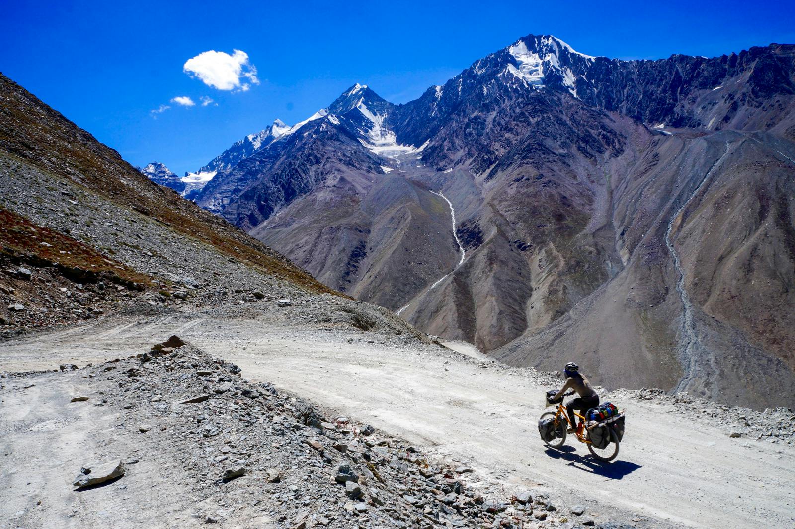 cyclist in the spiti valley himalayas
