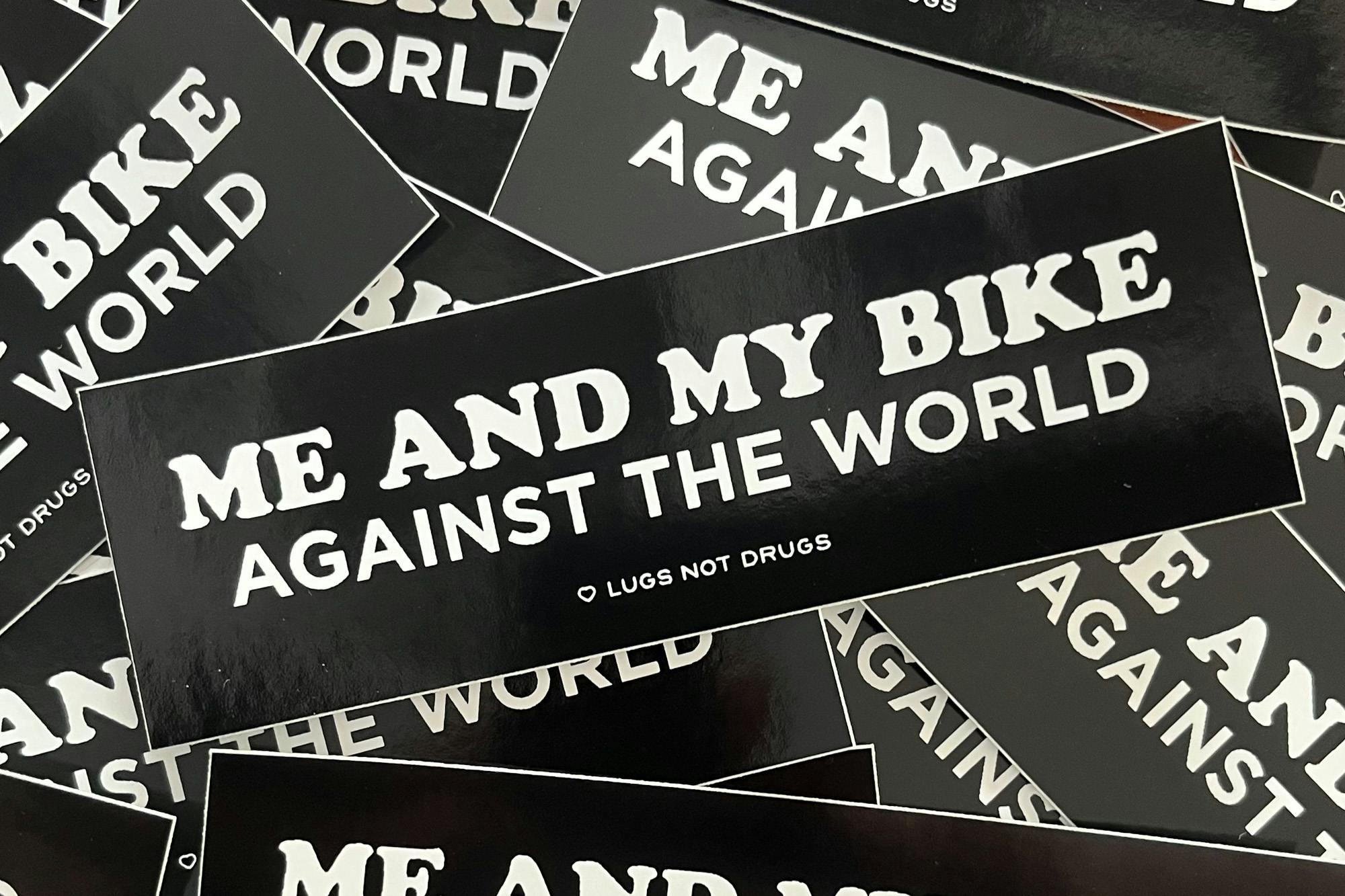 Me and my bike against the world sticker.