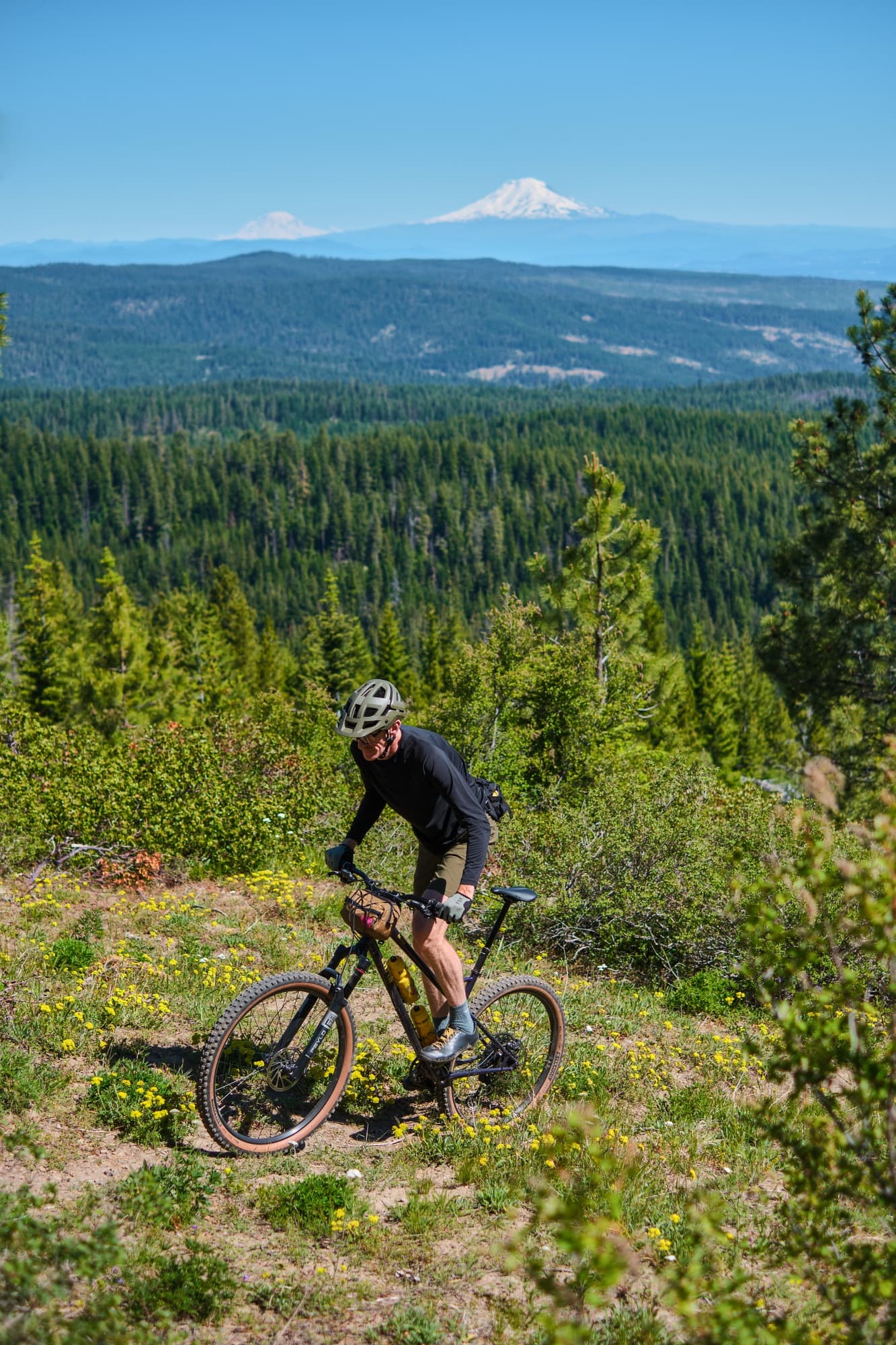 High above the valley with the Cascade volcanoes on the horizon