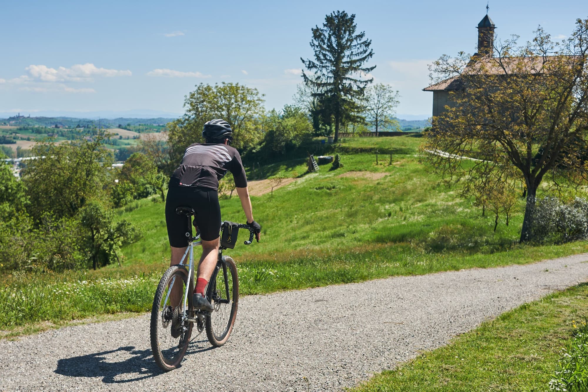 Davide rides with the Apidura Expedition Stem Pack.