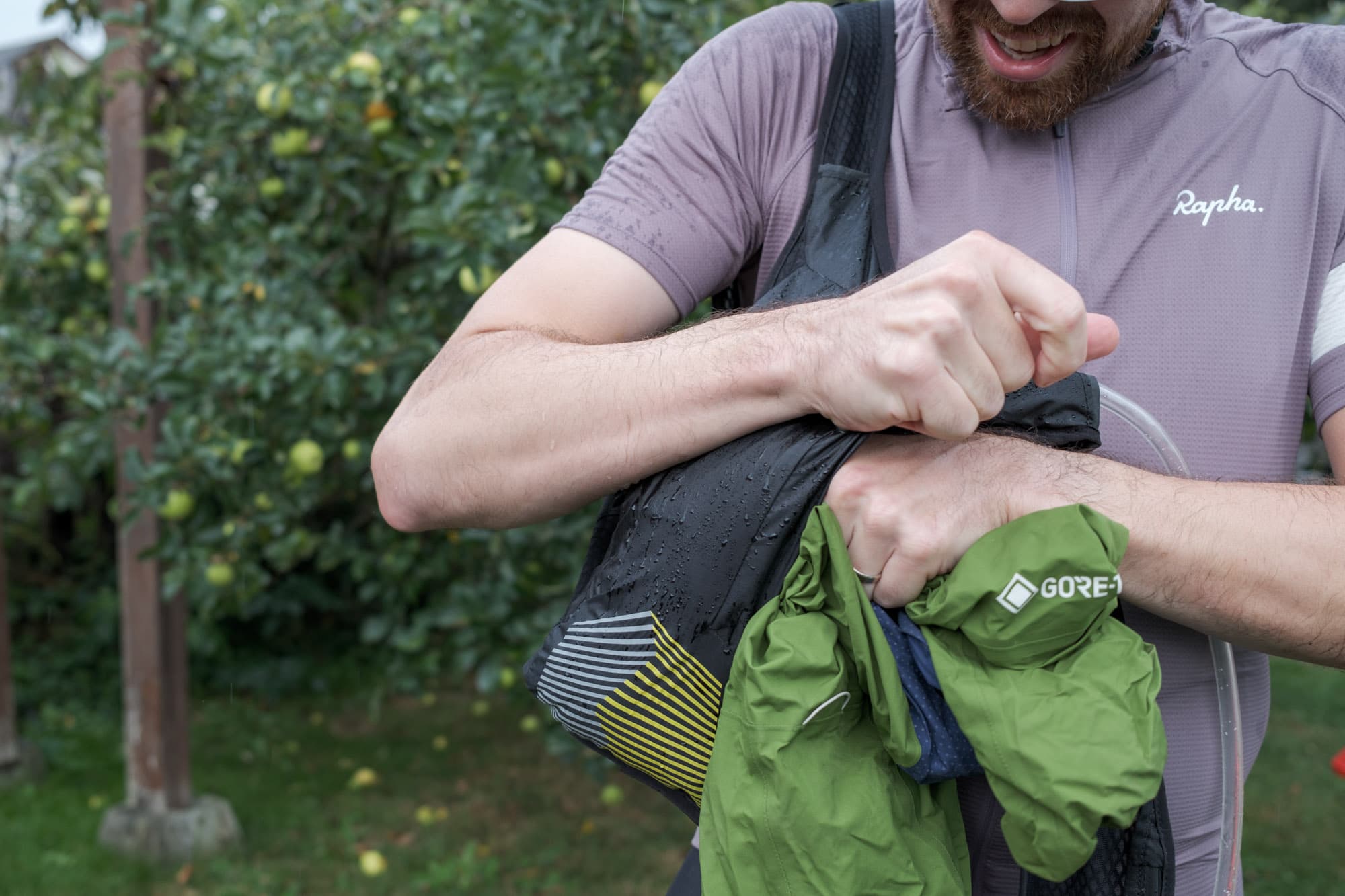 Jaff takes his jacket out of the vest.