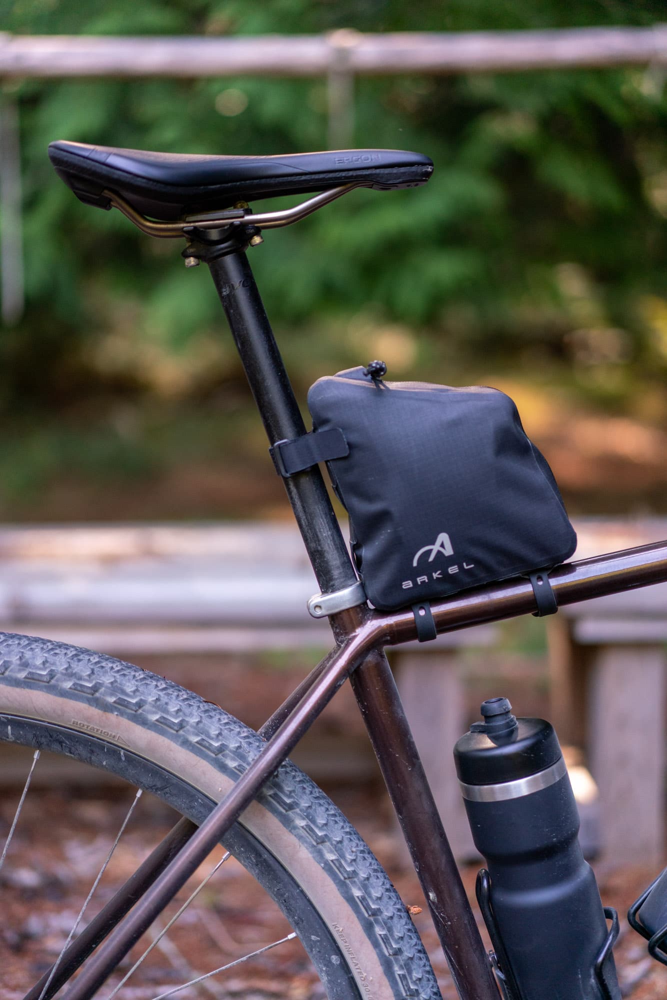 A side view of the rear bag mounted behind the saddle.
