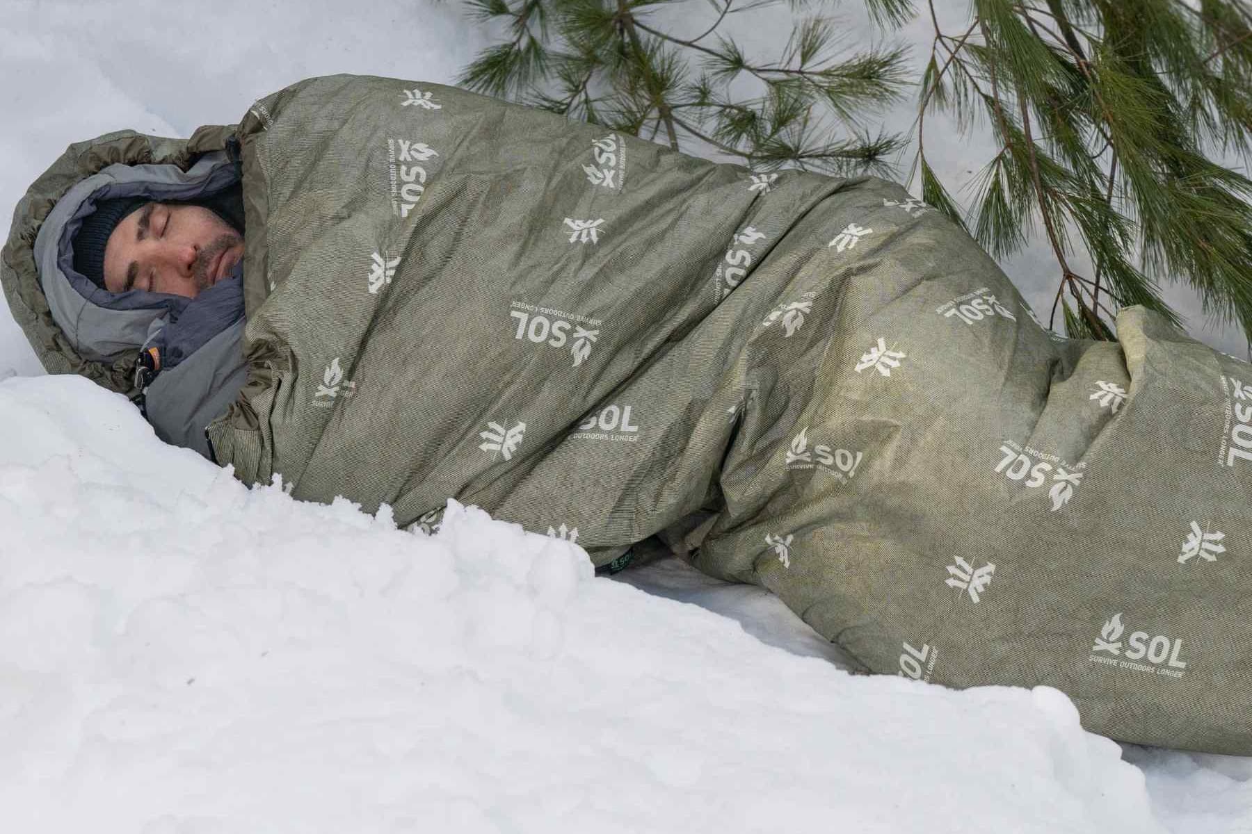 SOL Escape Bivvy used as a minimalist bivy in the snow