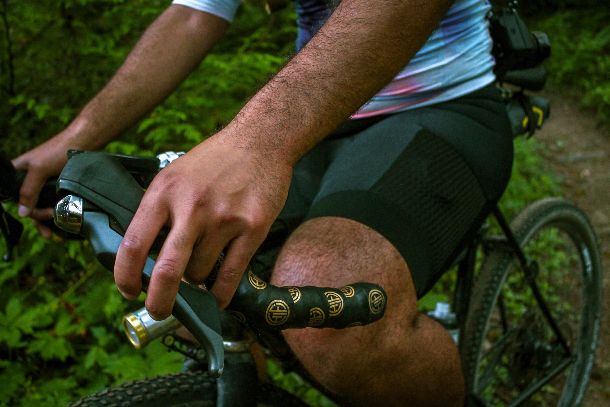 On the saddle.